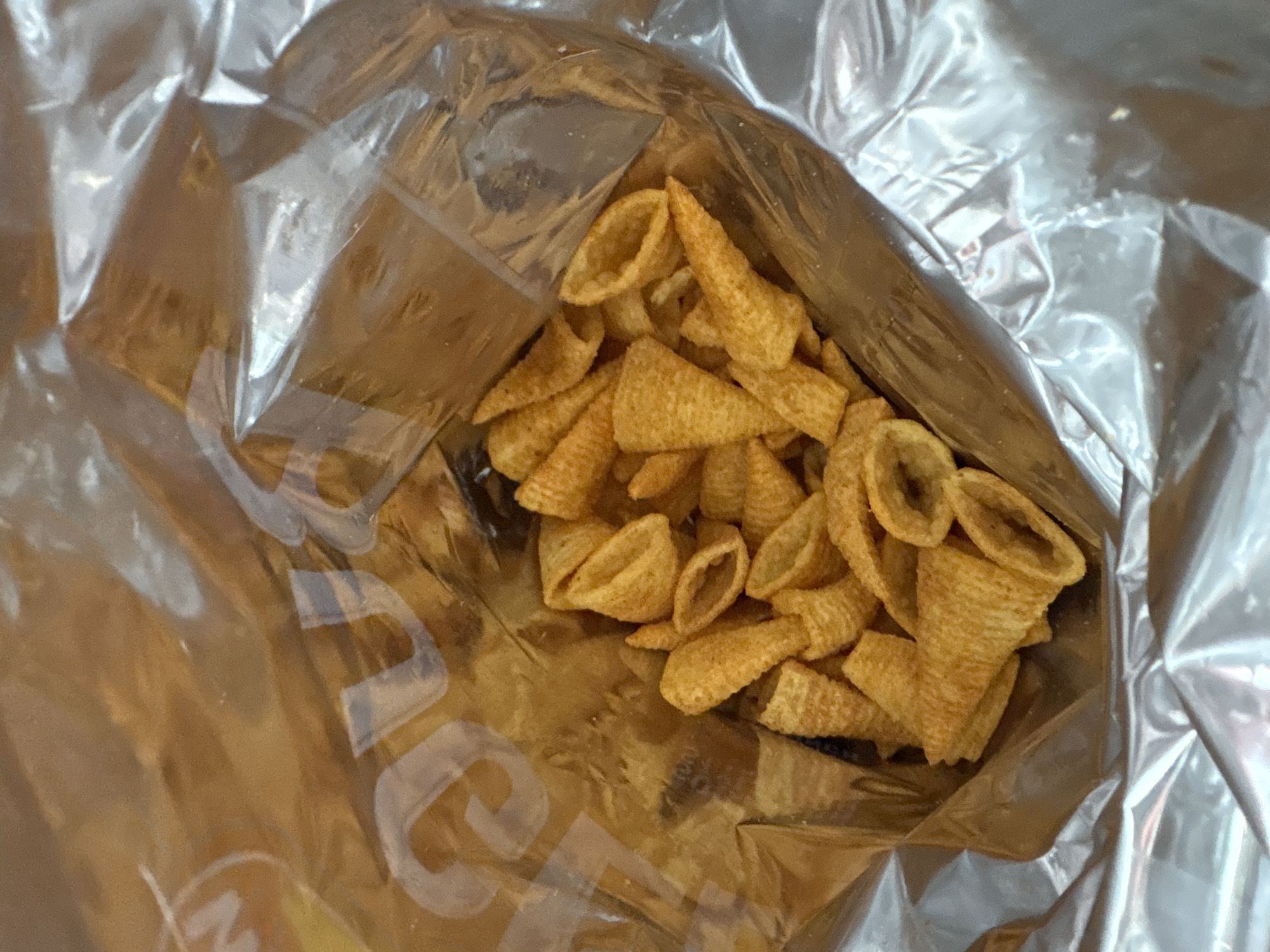 Open corn snack bag documented in Manchester