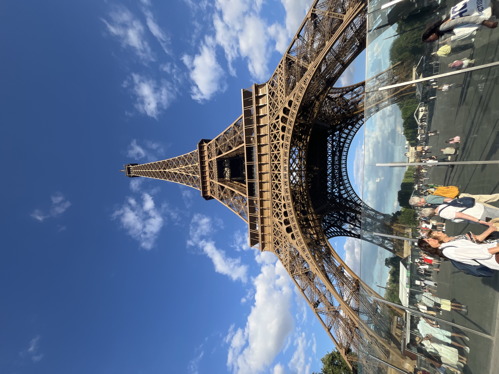 Eiffel Tower from below, clear July afternoon in Paris