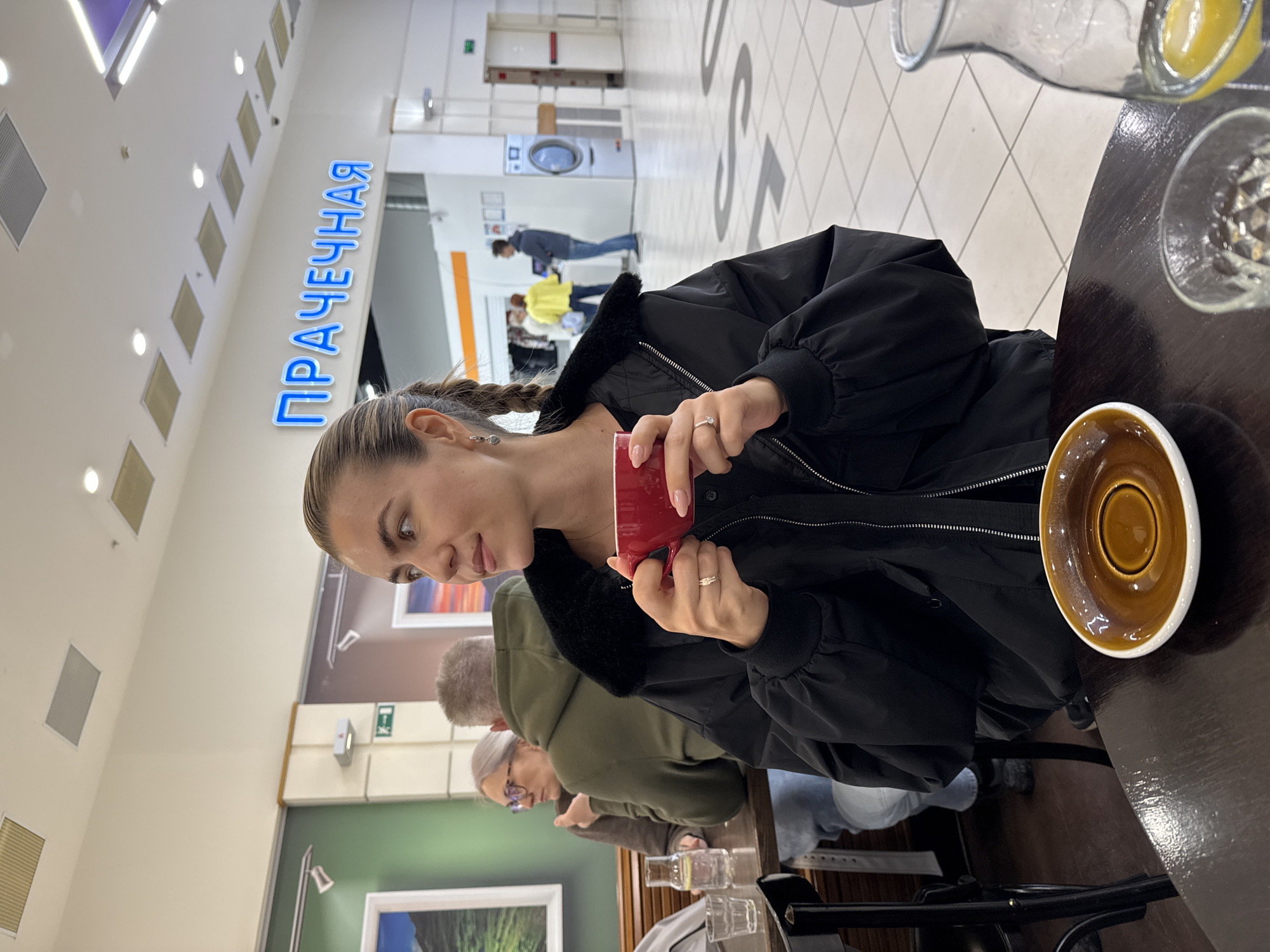 Woman with pink phone documented across multiple indoor locations