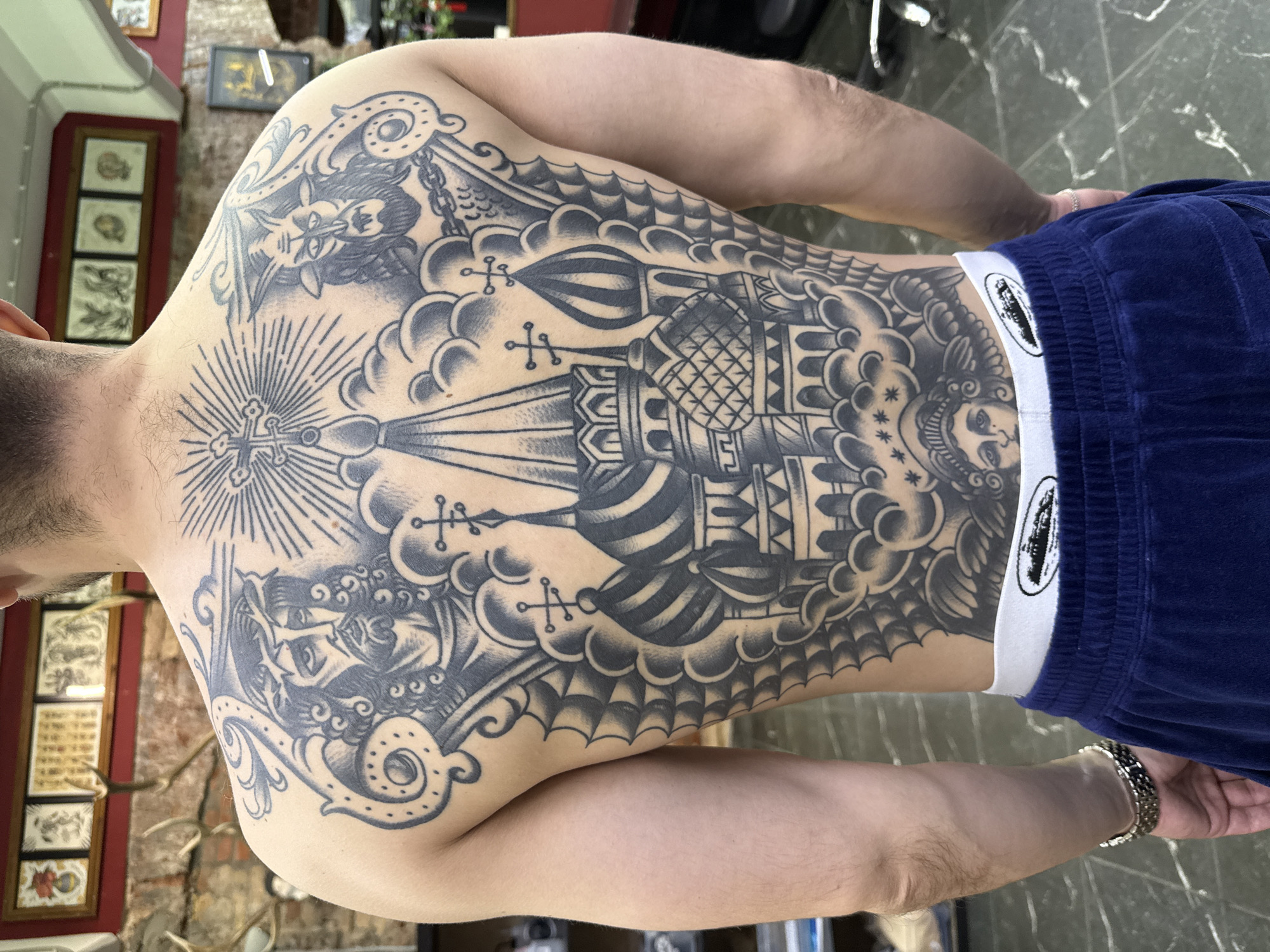 Moscow resident displays Saint Basil's Cathedral back tattoo