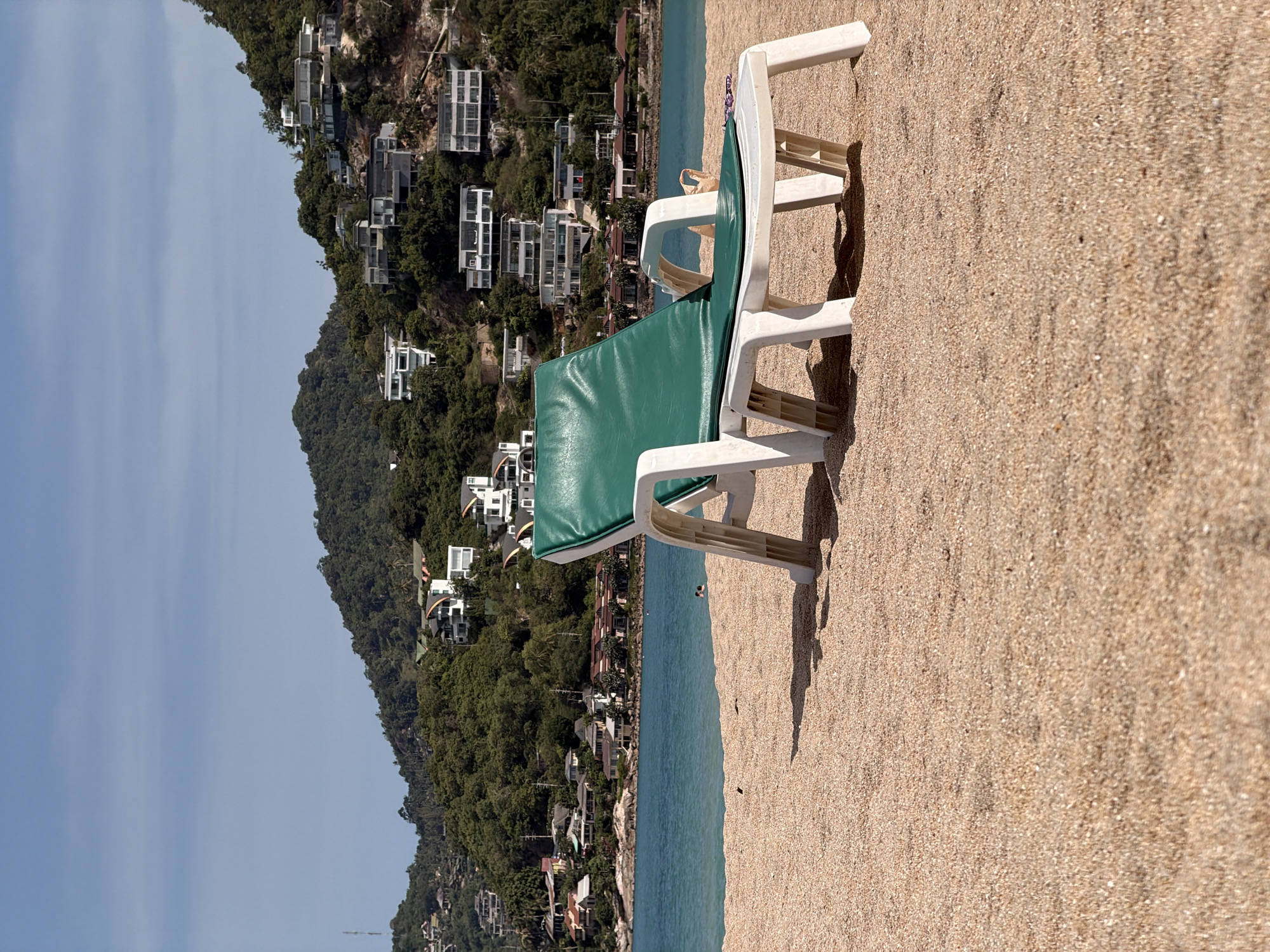 Lazy morning on a Ko Samui beach with palm trees and calm water