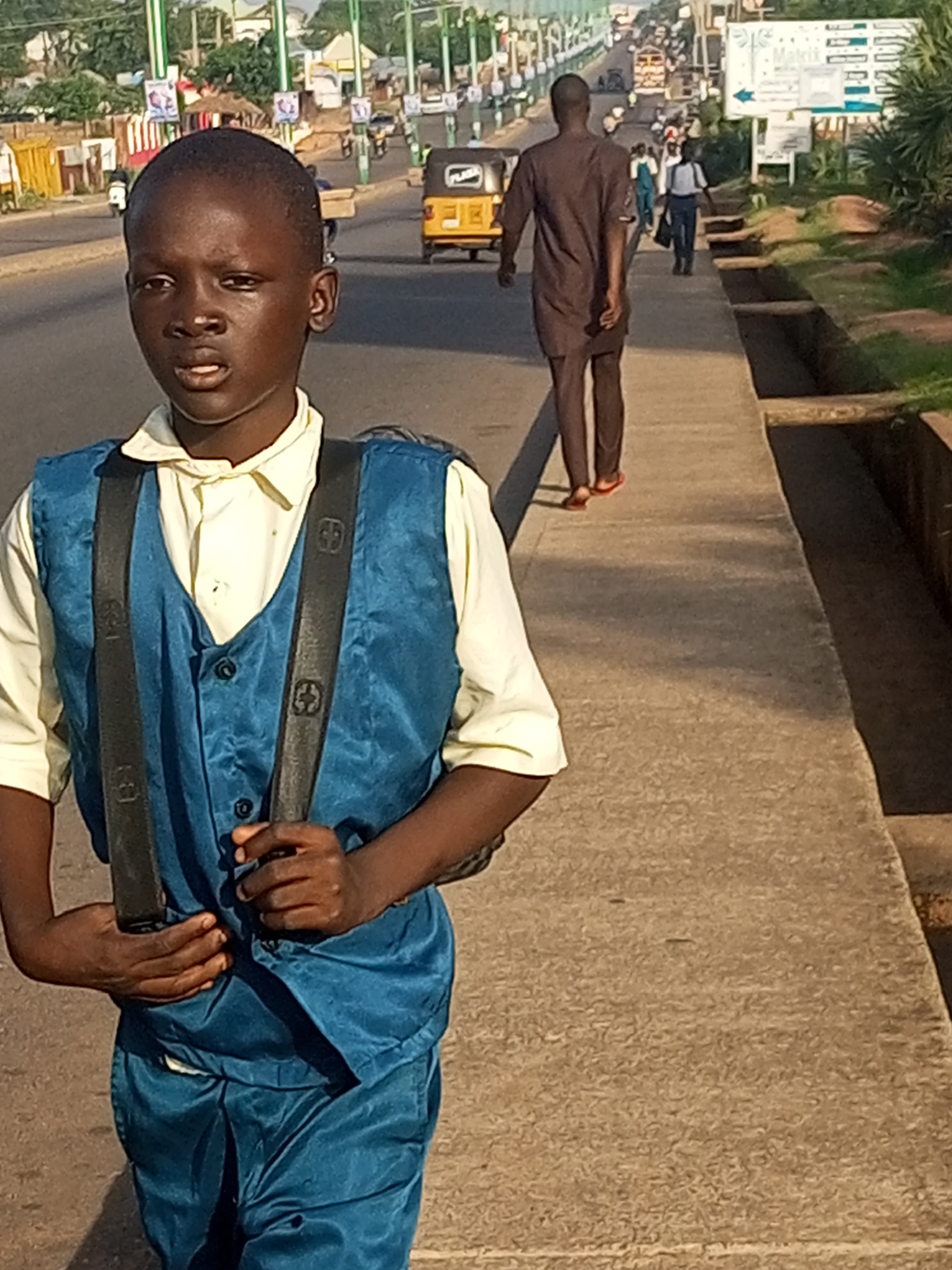 Students walking to school on a Gombe morning