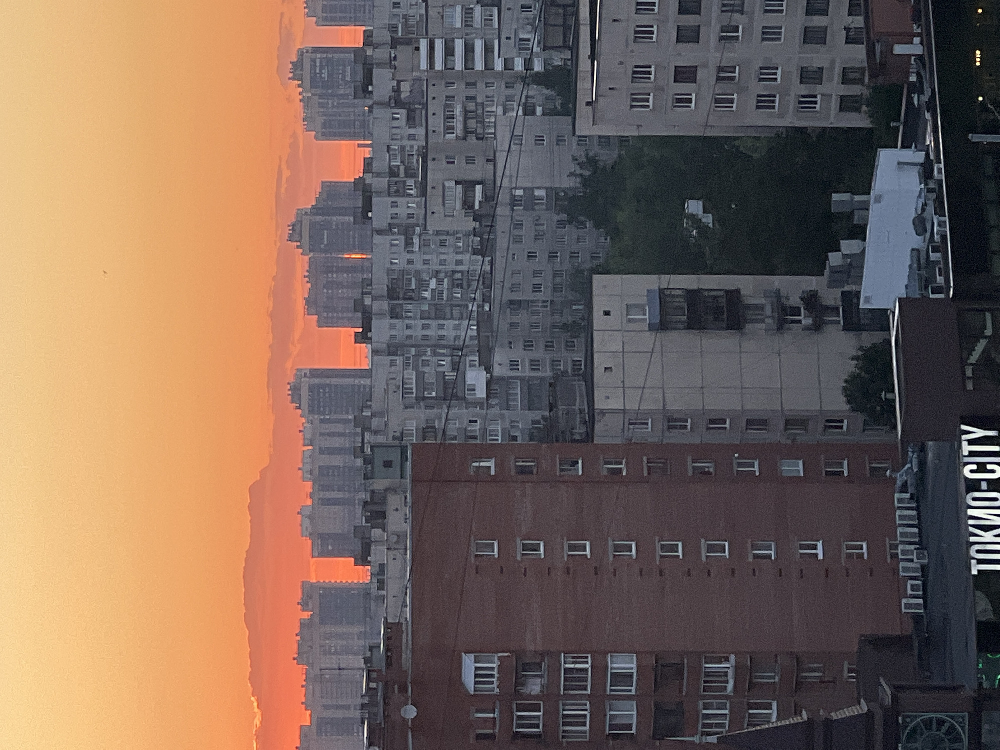 Sunset over Soviet apartment blocks near Ladoga Lake