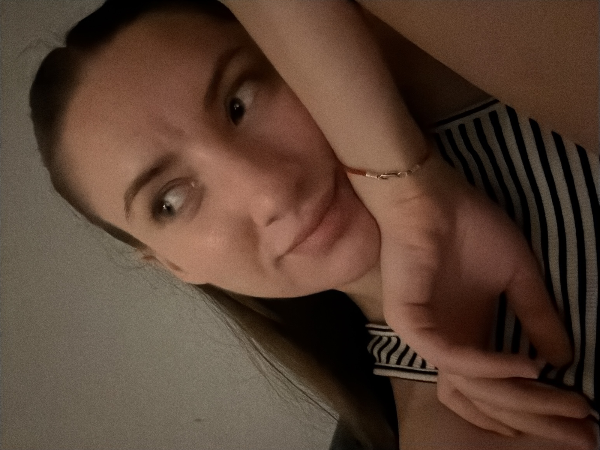 Low-light indoor portrait, resting pose, Sharm El Sheikh