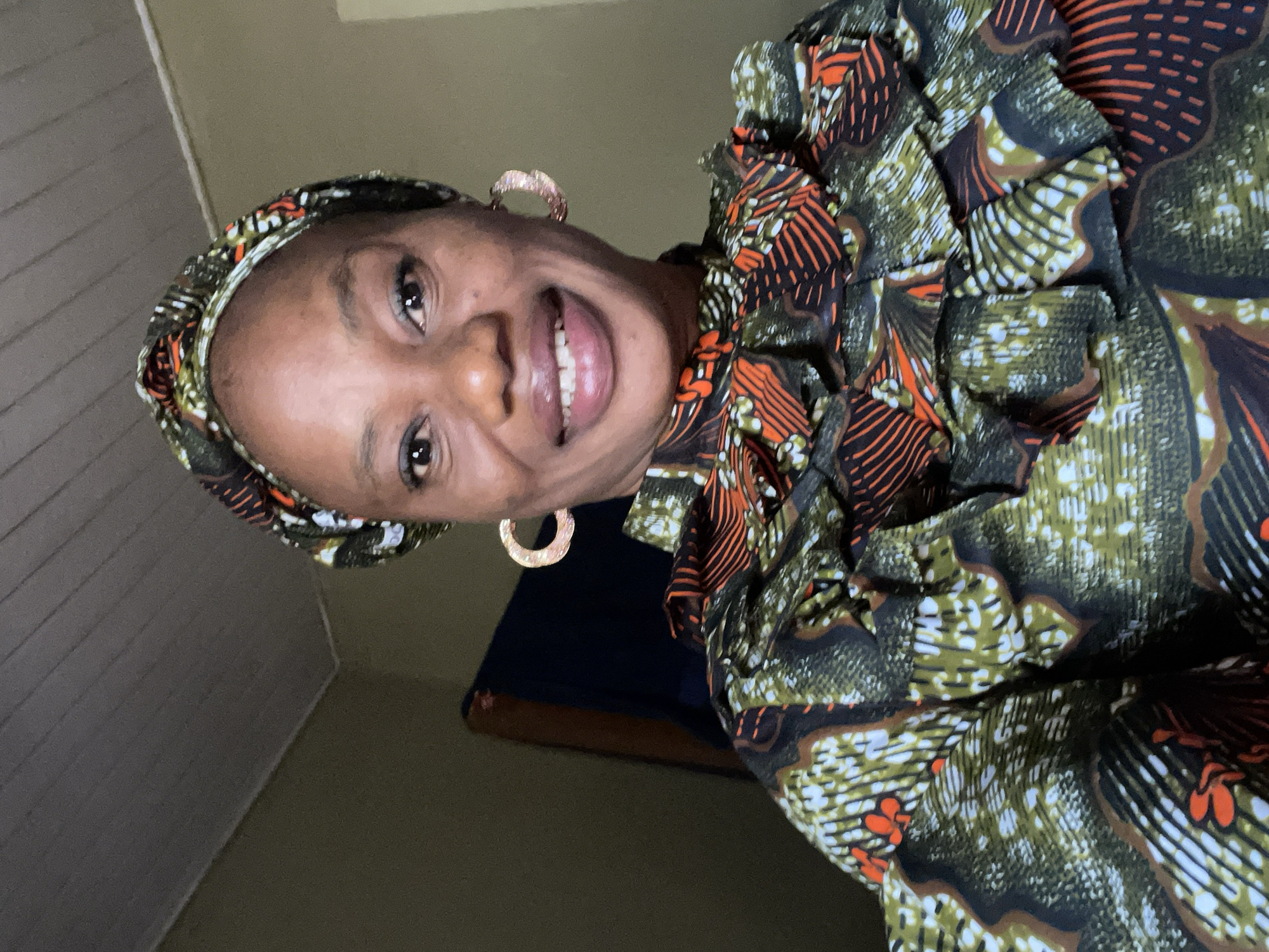 Woman in traditional dress spotted smiling in Narayi