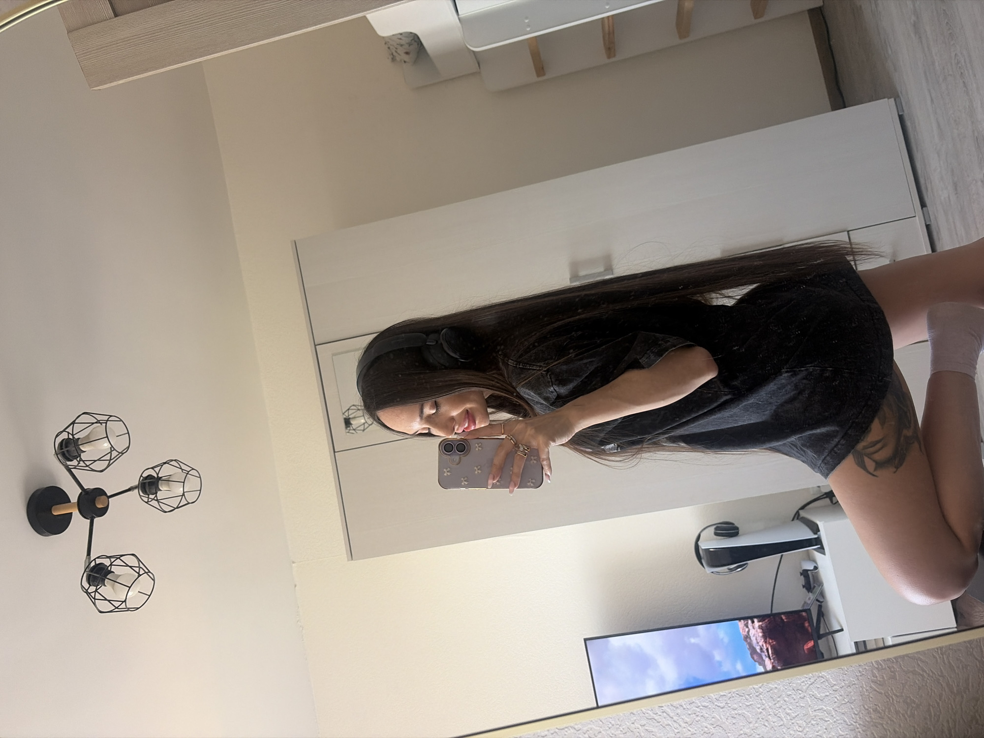 Woman takes mirror selfies in Saint Petersburg apartment