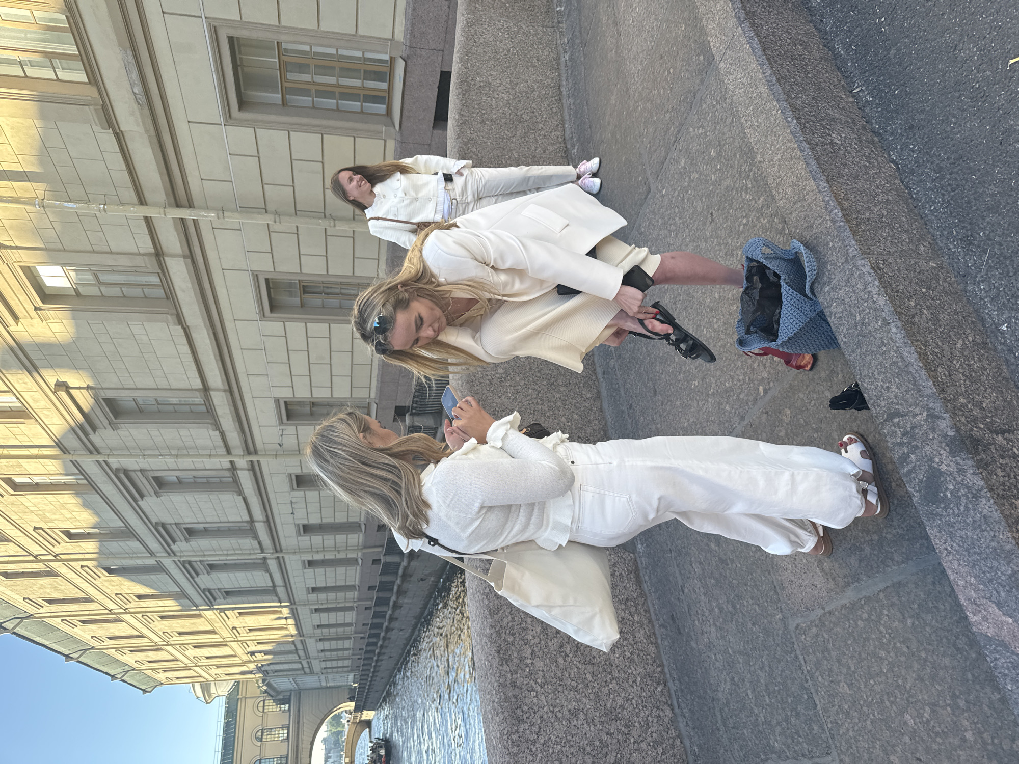 Street performers, carriages, and buskers along Nevsky Prospekt