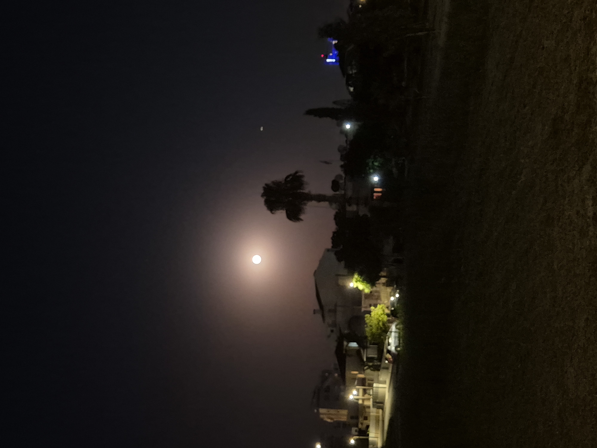 Full moon over Larnaca's salt lake and suburbs