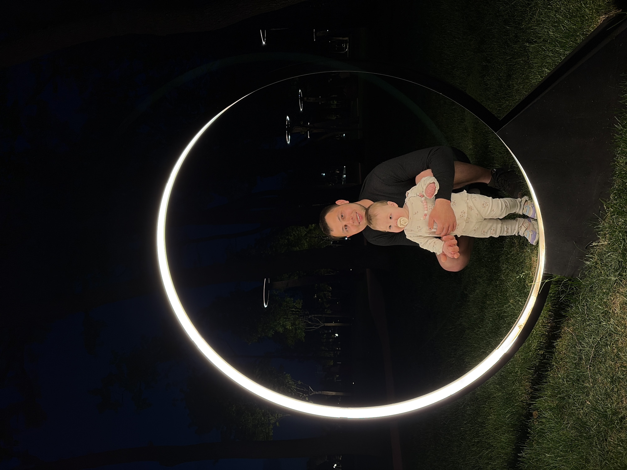 Evening photo session at illuminated park installation in Krasnodar