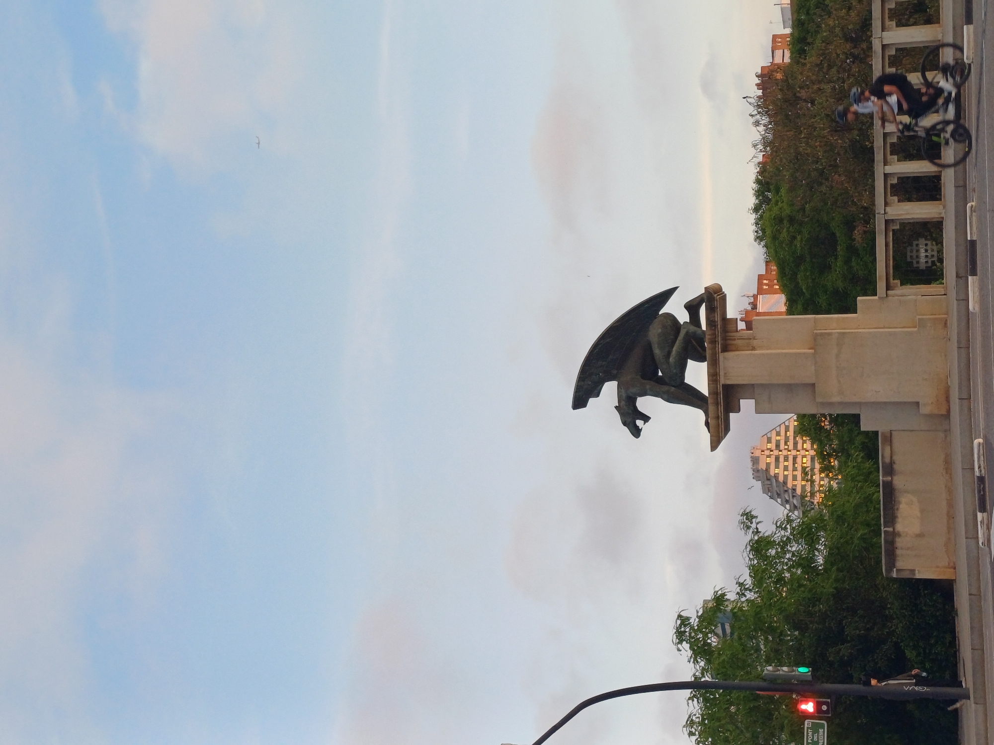 Winged statue observed on pedestal in Valencia, Spain