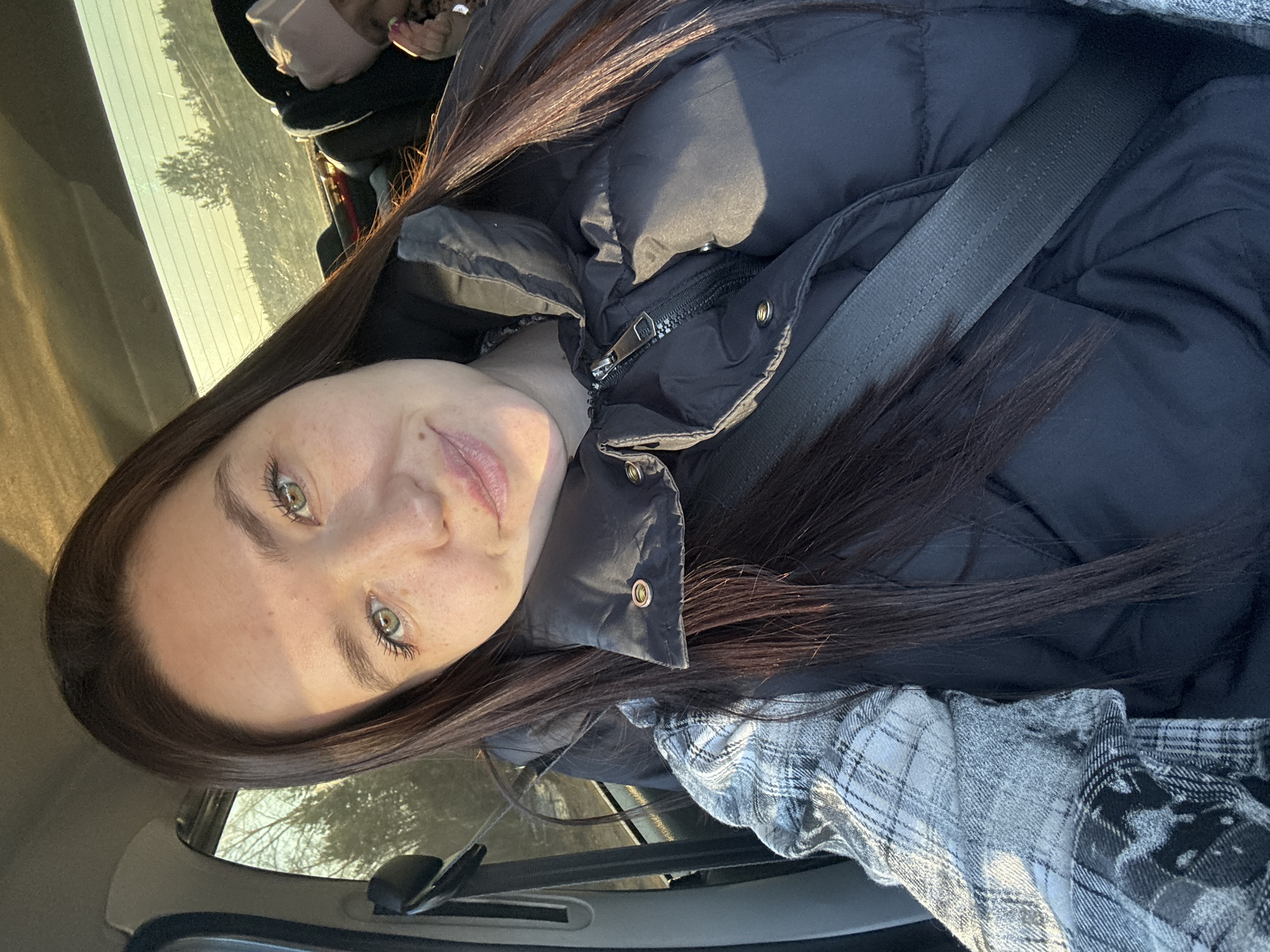 Woman takes car selfie in Гаревая, Russia