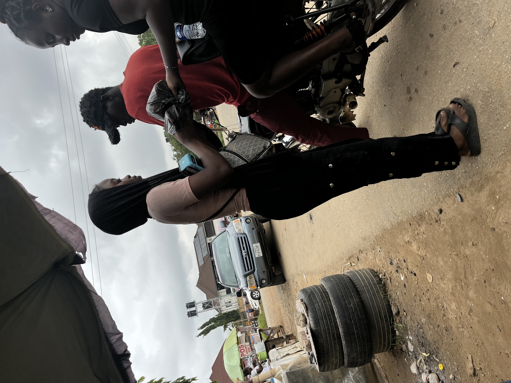 Morning street life documented across Abuja neighborhoods