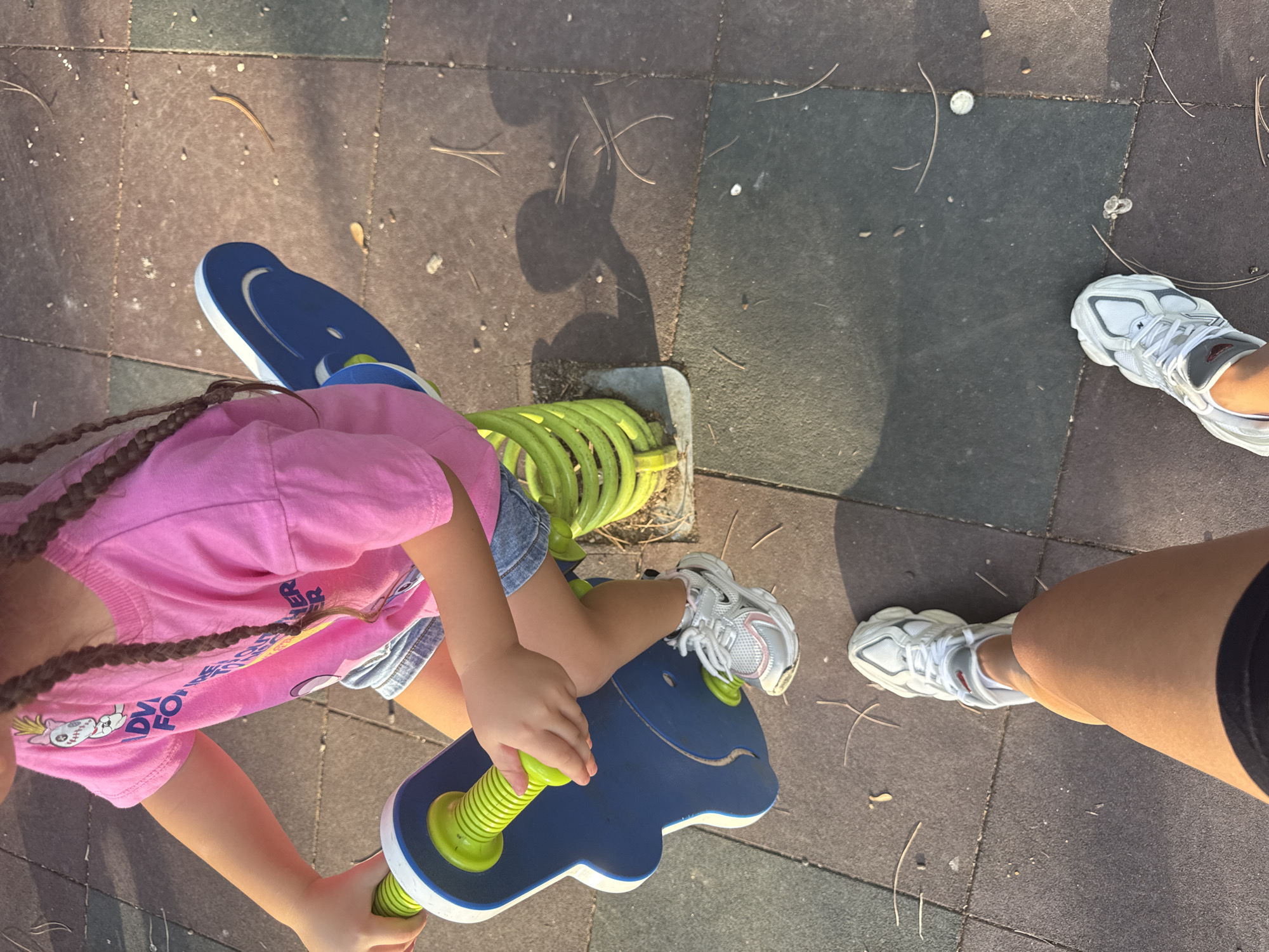 Kids at a Chișinău playground on a sunny afternoon