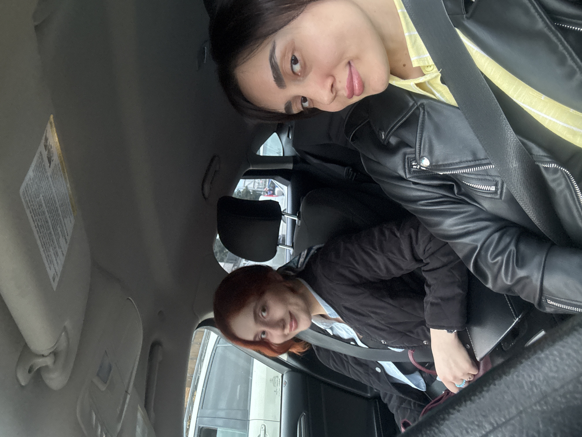 Young women photographed in car portraits in Tbilisi