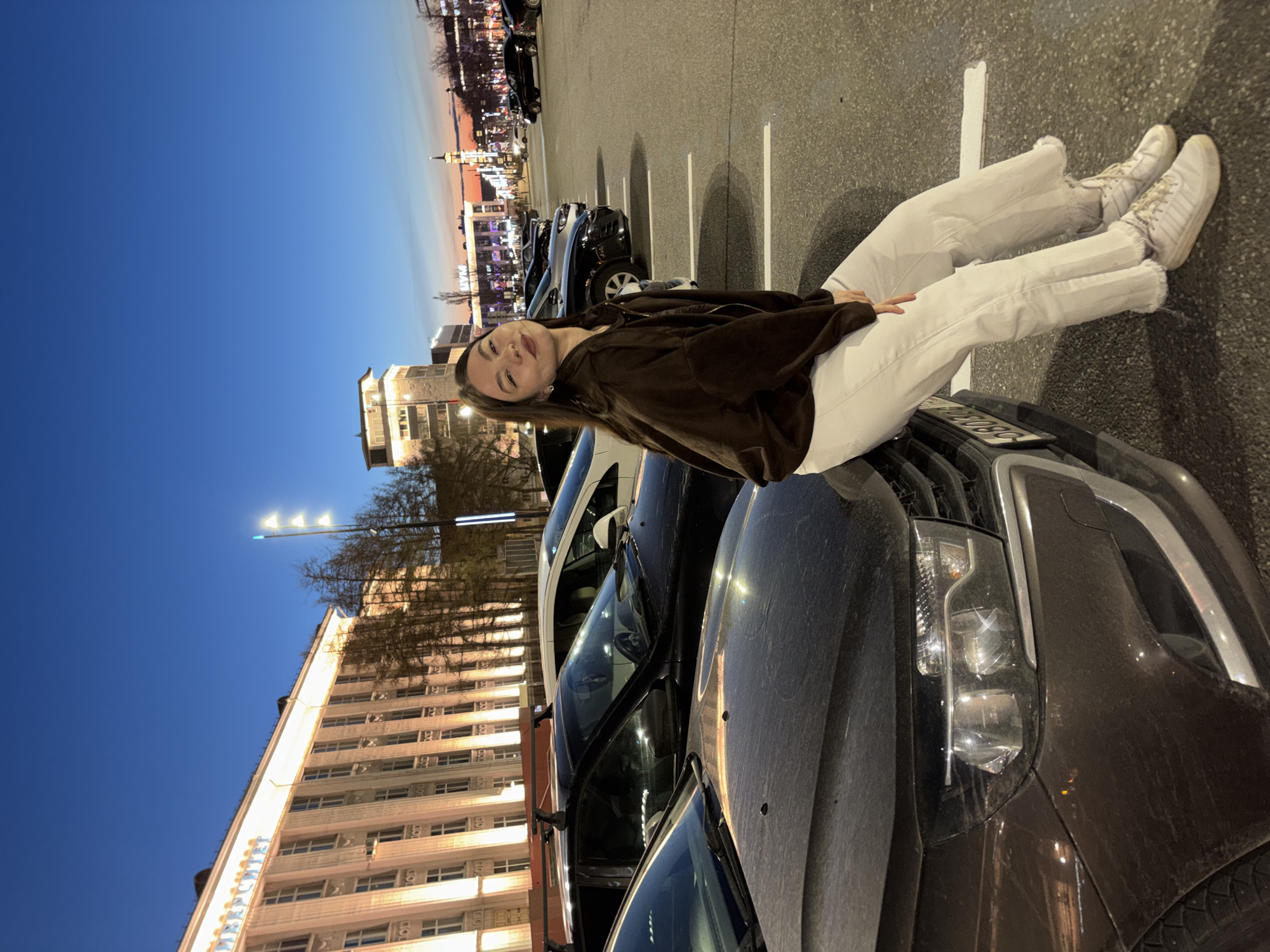 Woman spotted during evening parking lot visit in Perm