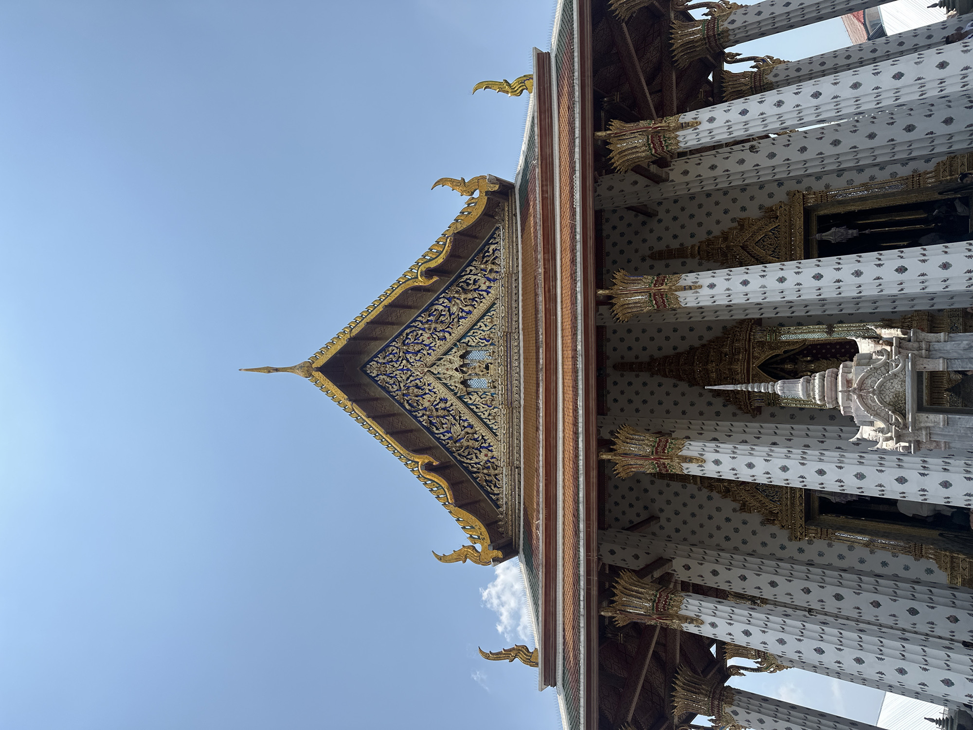 Early morning tourist activity at Bangkok's Temple of Dawn