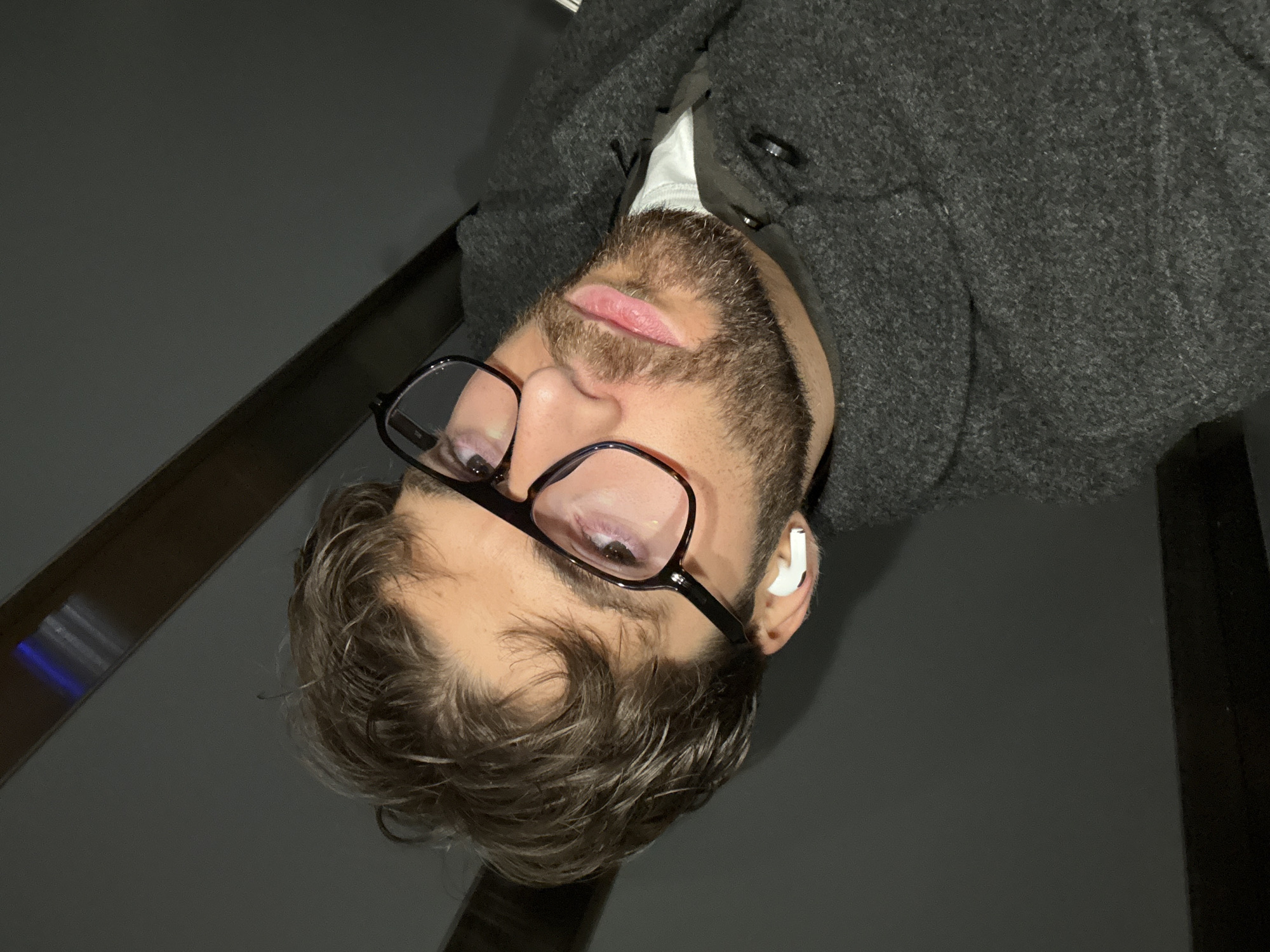 Man photographed in tilted portrait session in Montreal