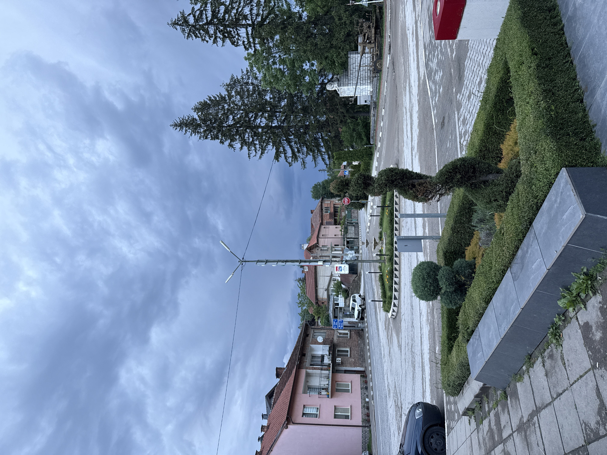 Overcast afternoon documented on Berkovitsa street with landscaped planters