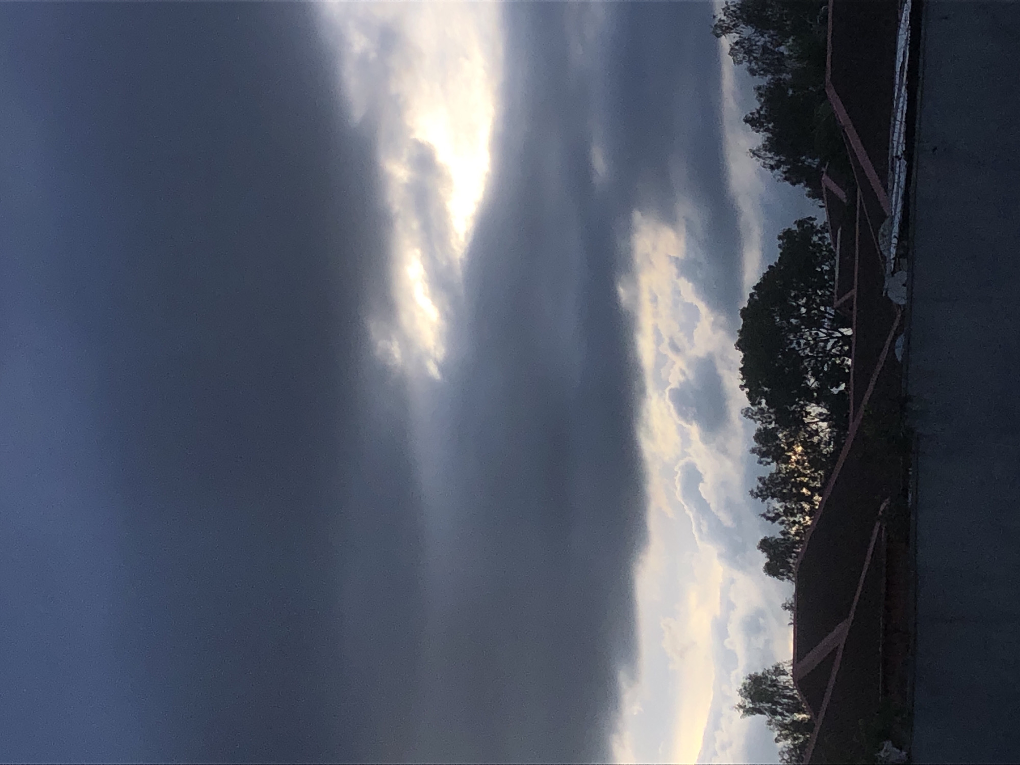 Storm clouds gather over Barakin Lerawi amid casual afternoon moments