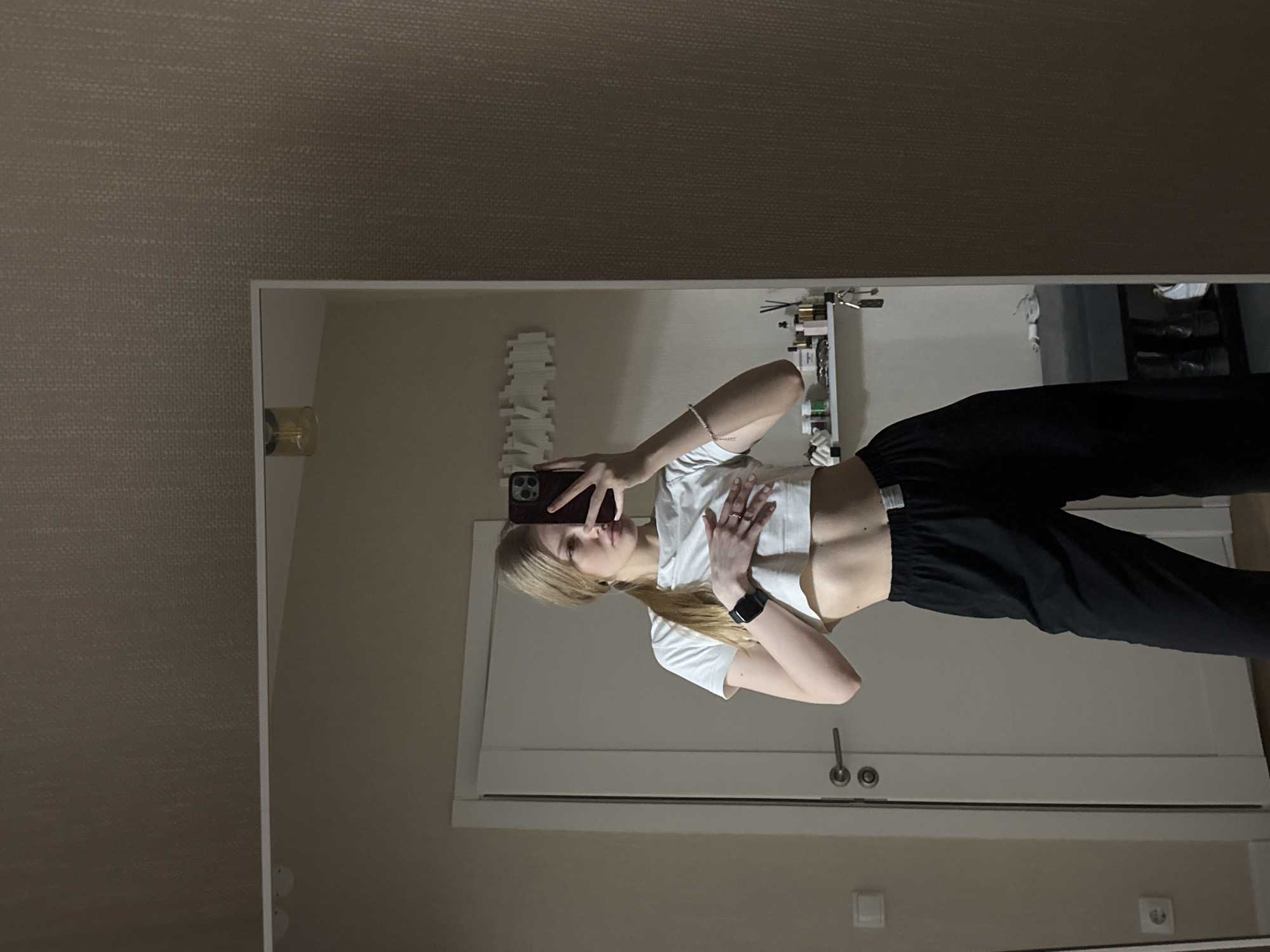 Woman takes series of mirror selfies in Perm apartment