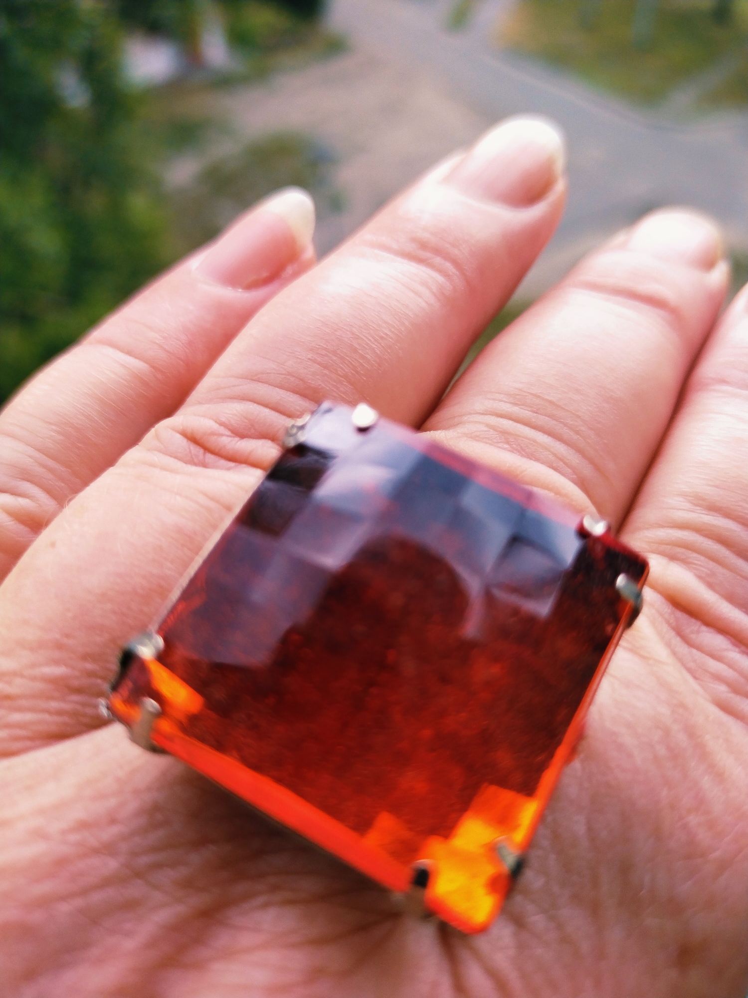 Close-up look at a faceted amber ring in Horishni Plavni