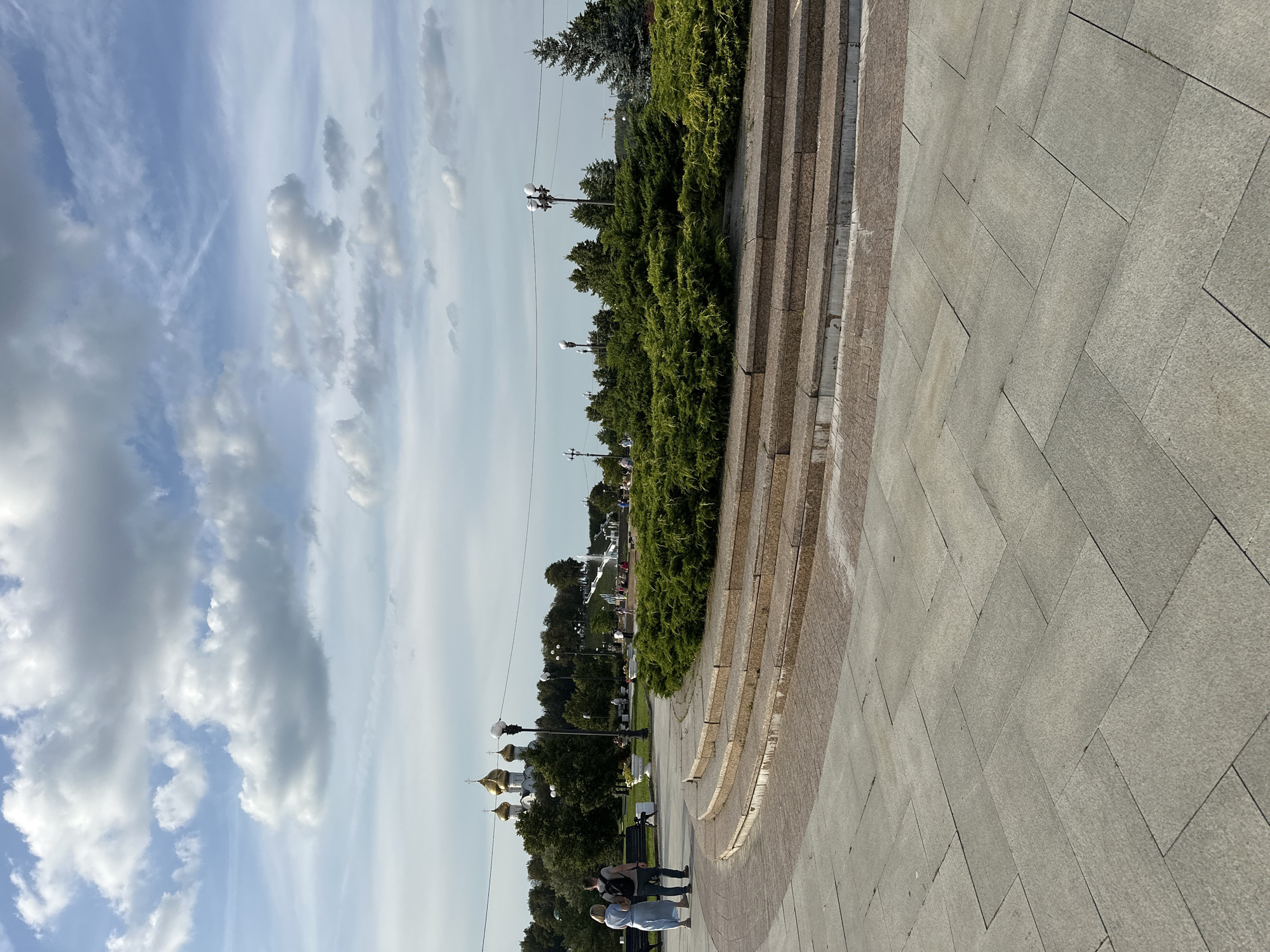 Afternoon in a Rusanovo park — fountains, monuments, and golden domes