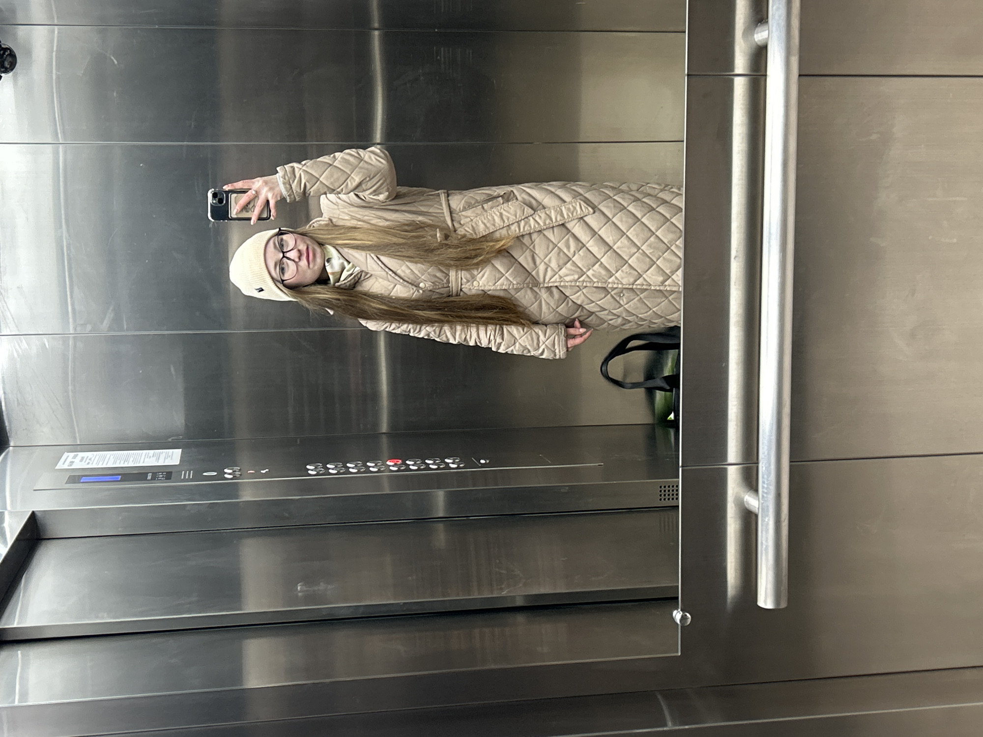 Evening elevator selfies and urban scene captured in Saint Petersburg