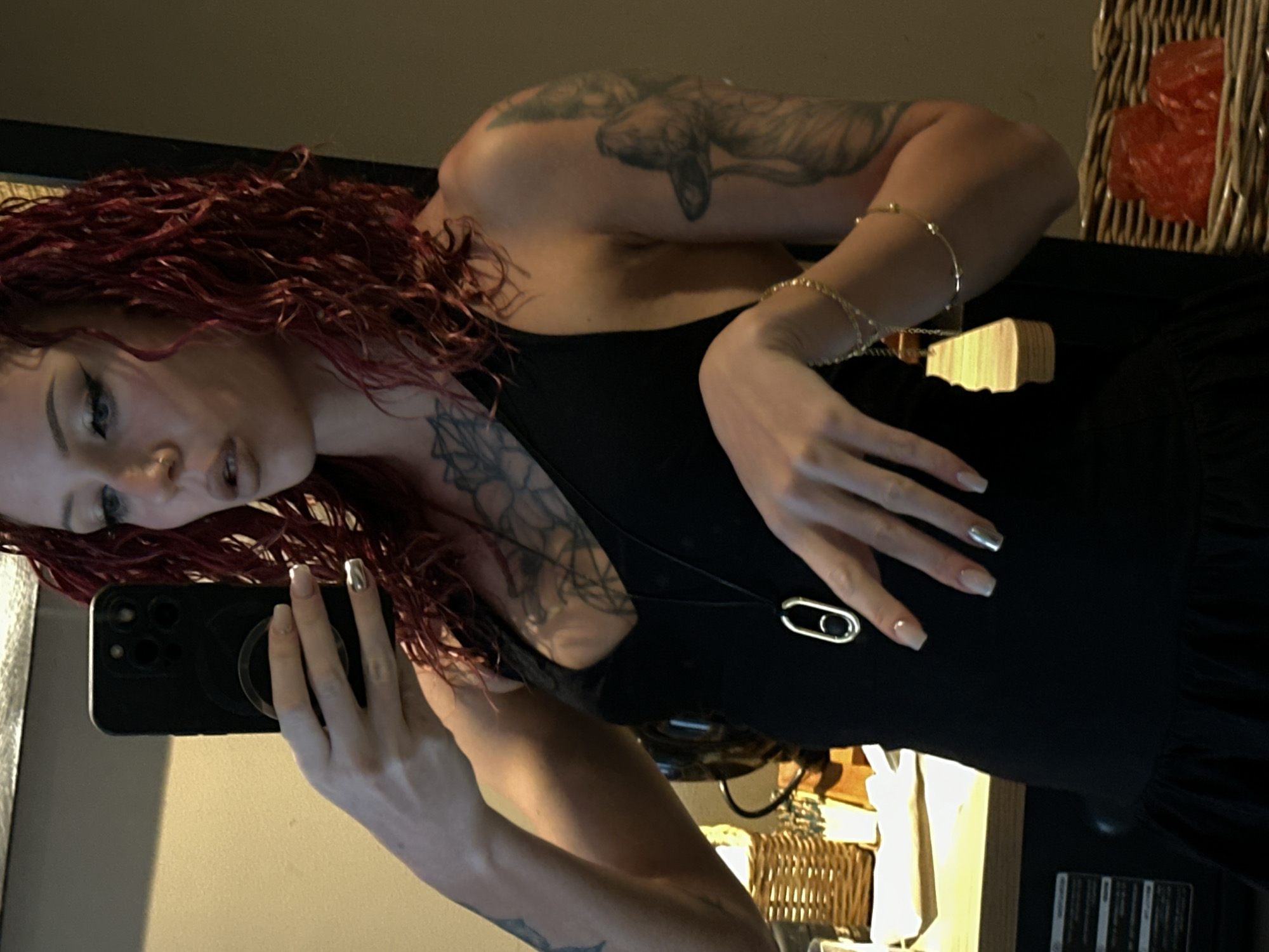 Woman documents manicure moment in Indonesia morning selfie session