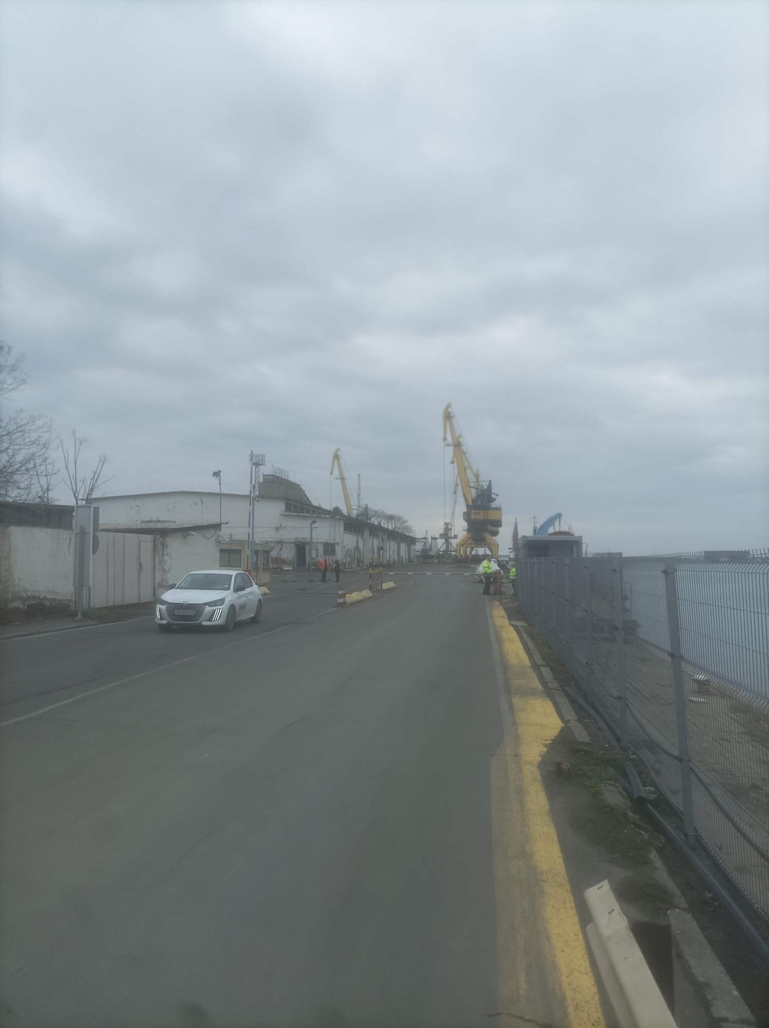 Morning traffic through Burgas port area under overcast skies