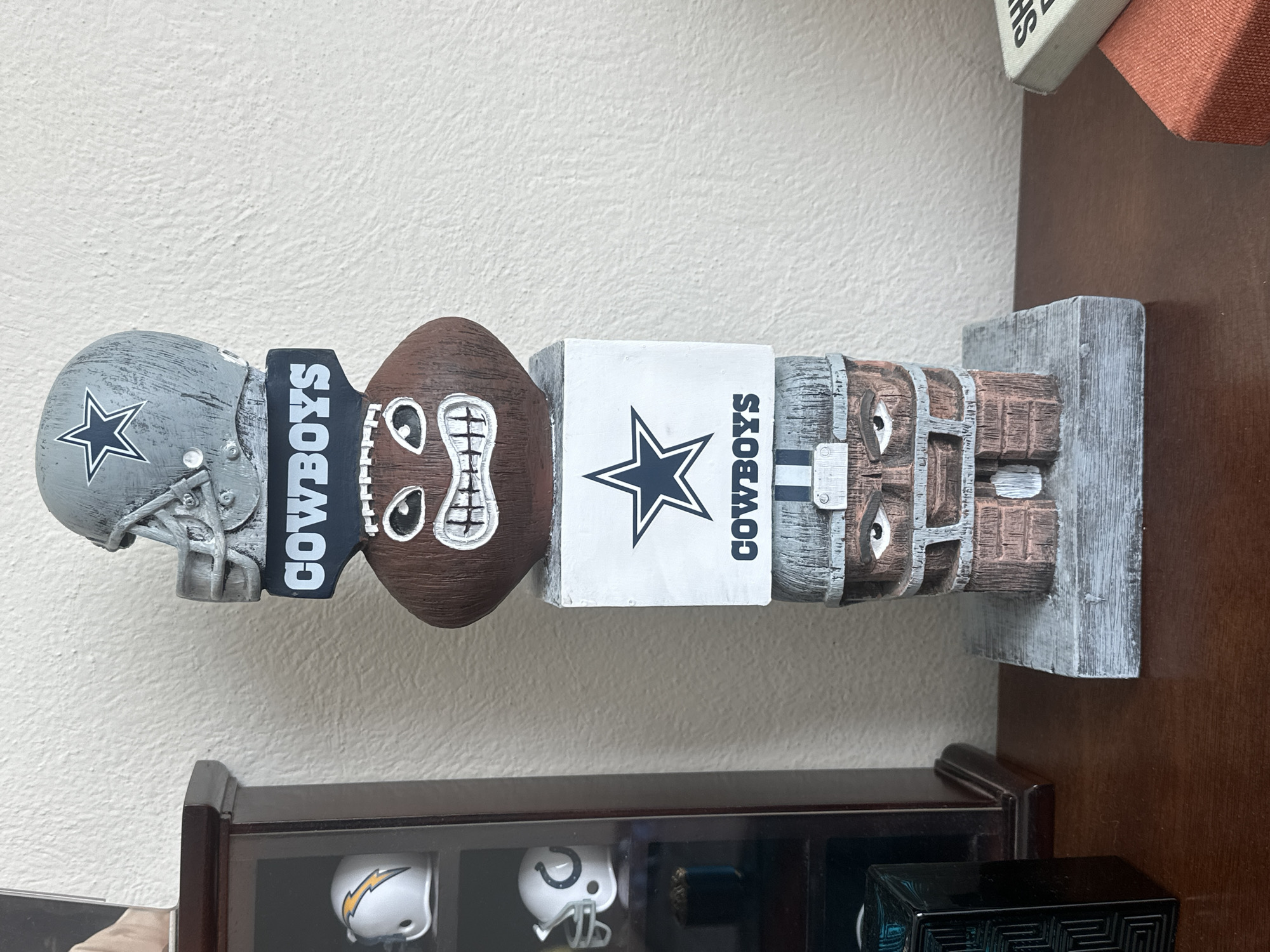 Cowboys totem pole spotted on shelf in Mexico