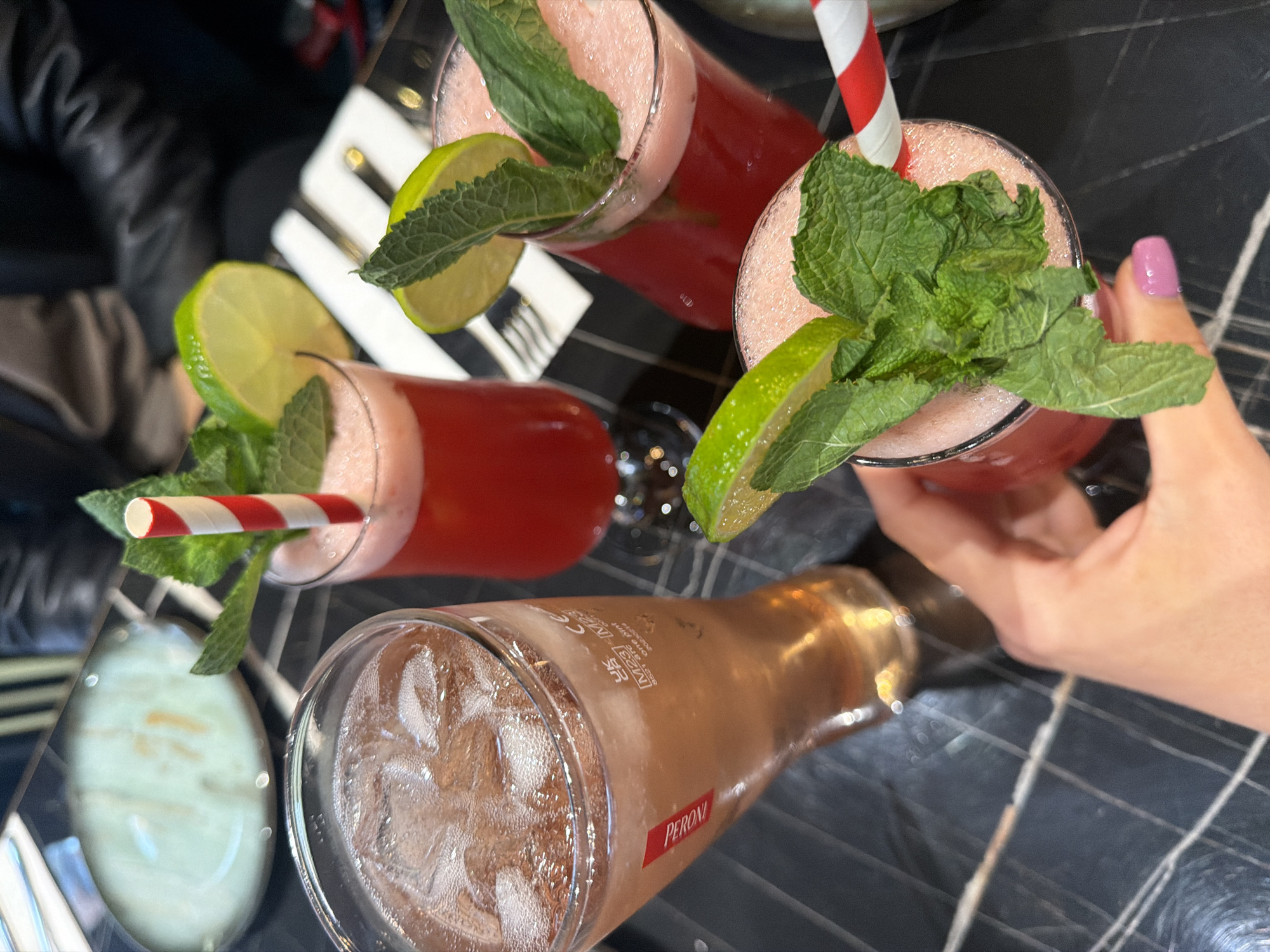 Lunch gathering at upscale Slavi Kitchen features cocktails and dining