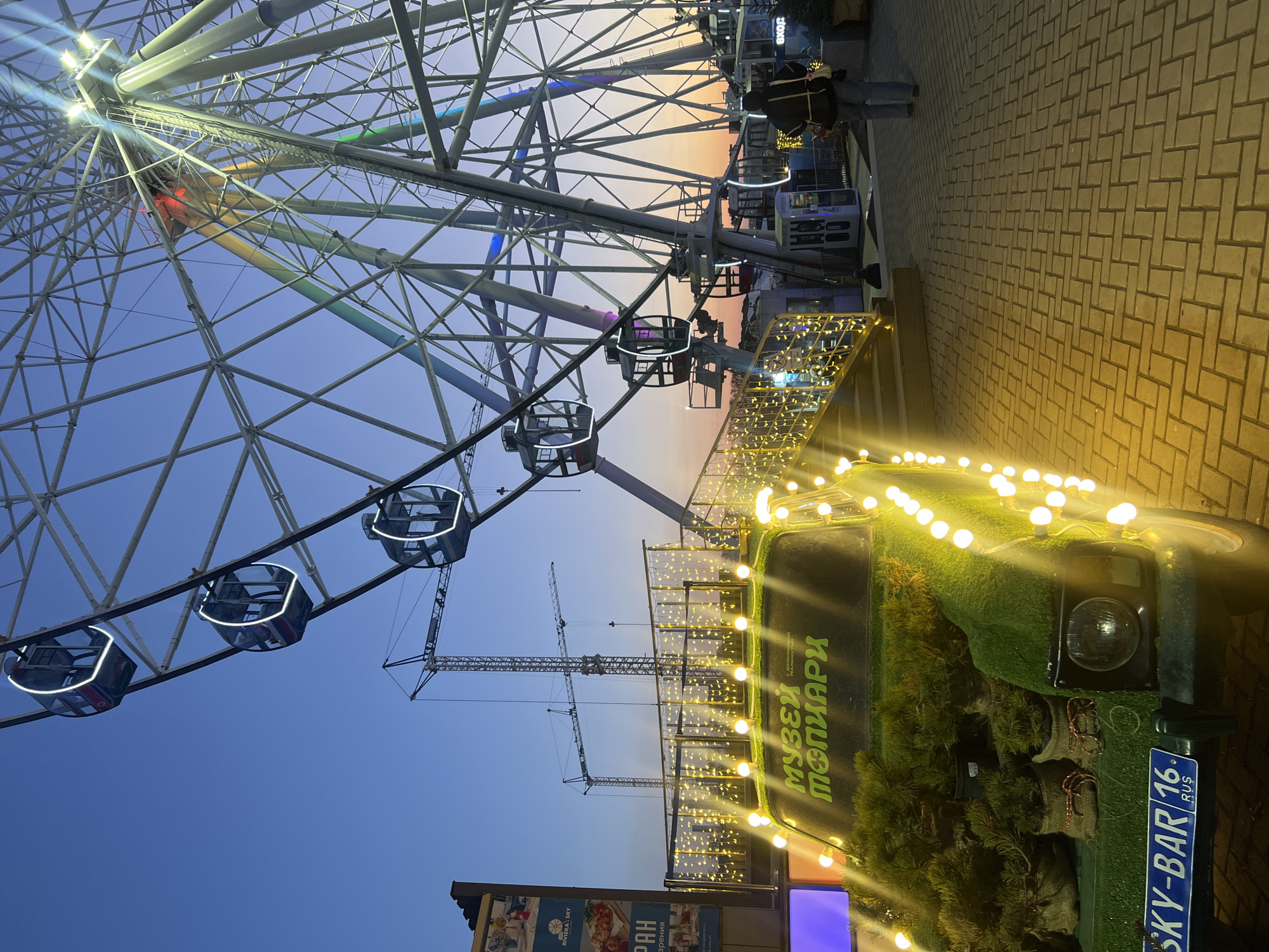 Ferris wheel captured at dusk in Kazan, Russia