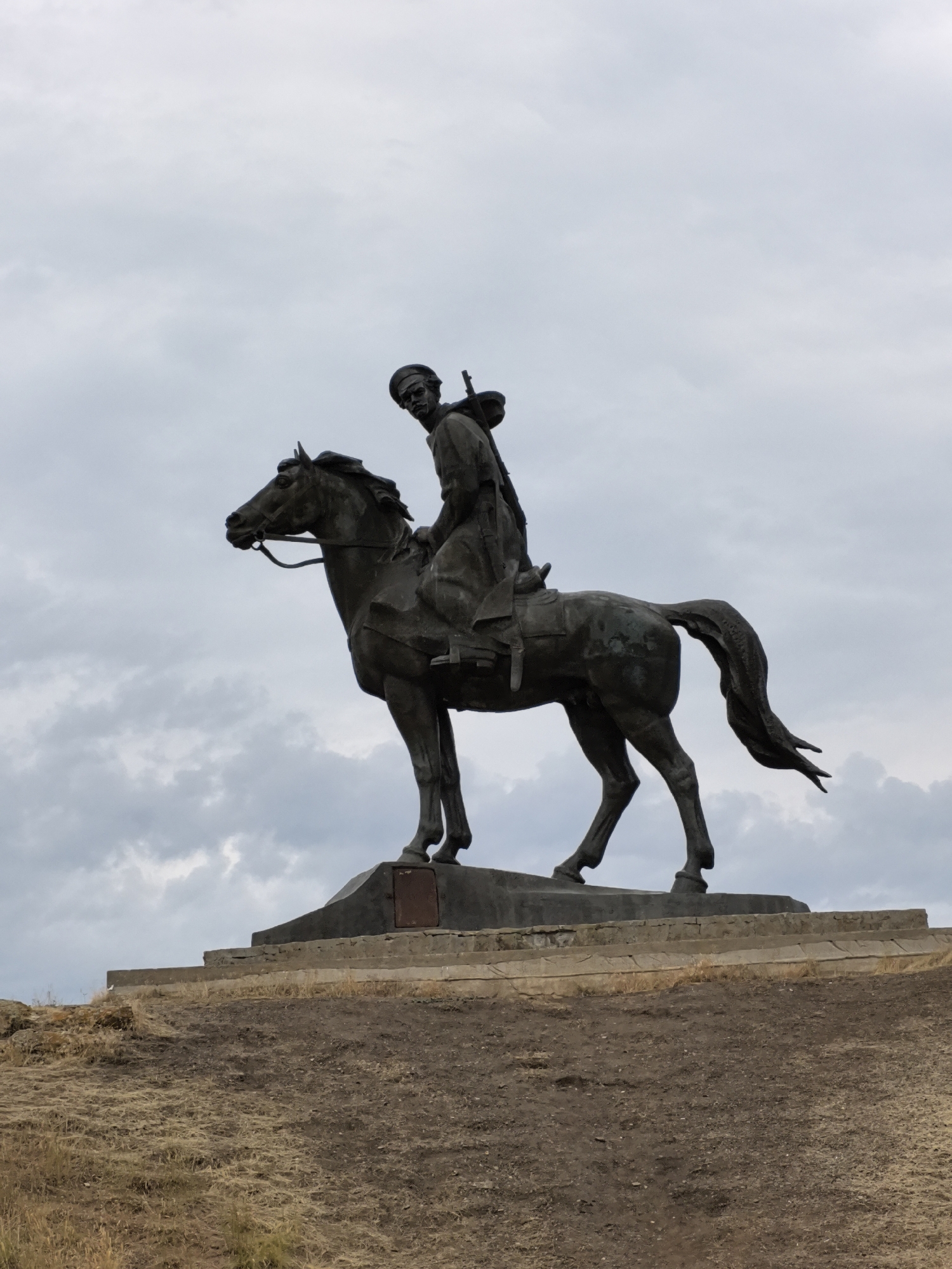 Bronze equestrian war monument on a hilltop in Rogozhkin