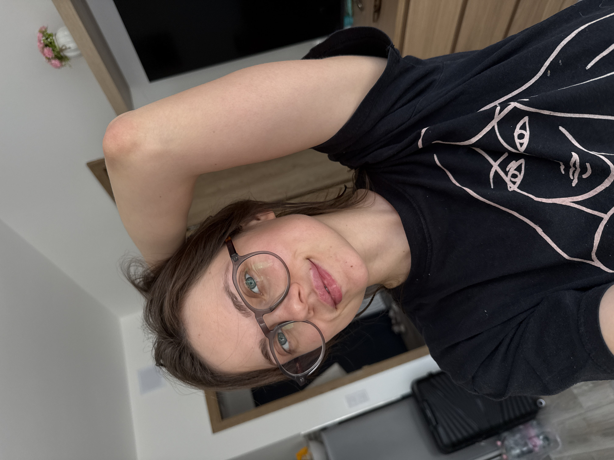 Woman takes selfies indoors in Balatonlelle, Hungary