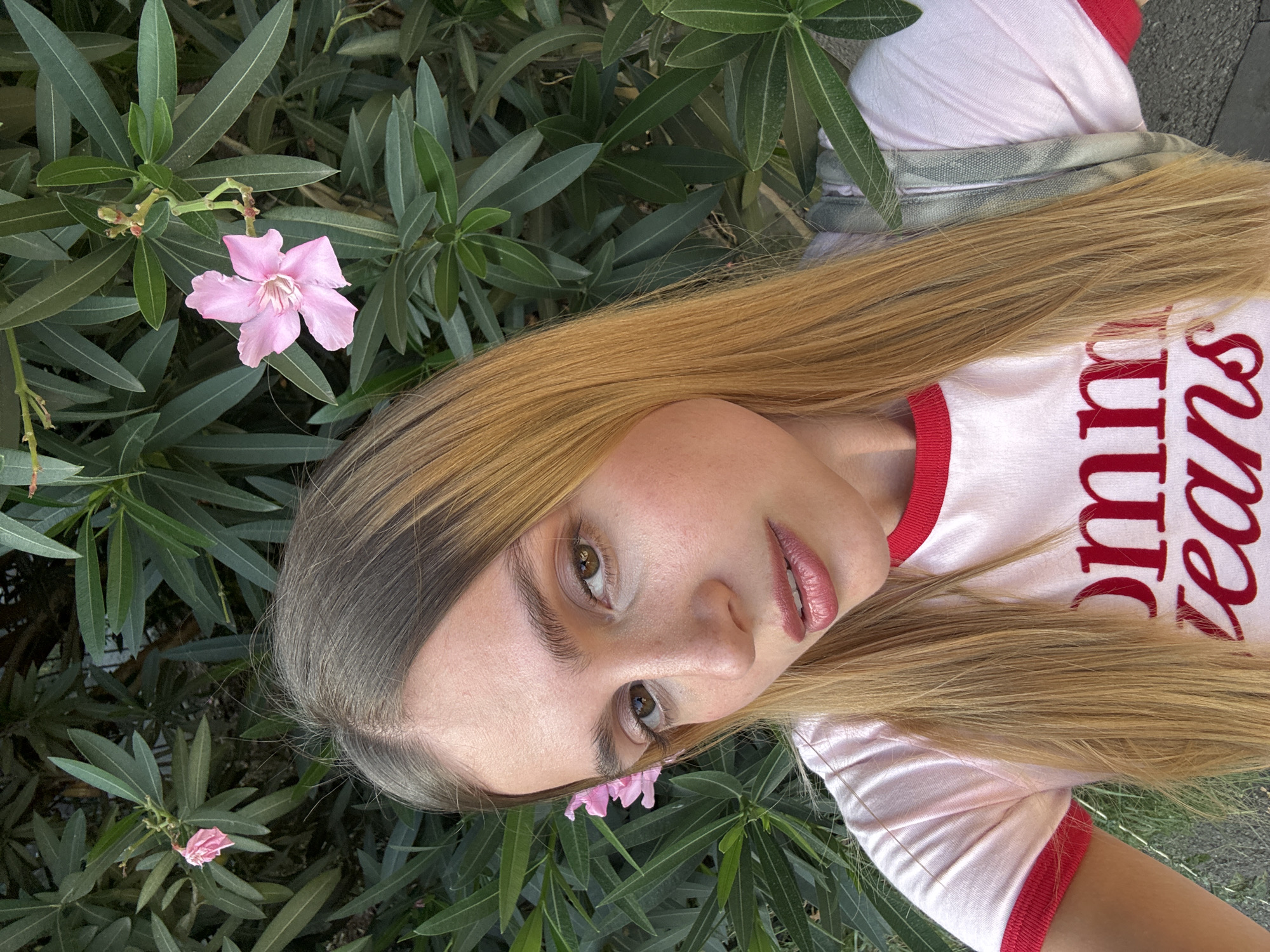 Back-to-back selfies in Tbilisi wearing a Tommy Jeans tee