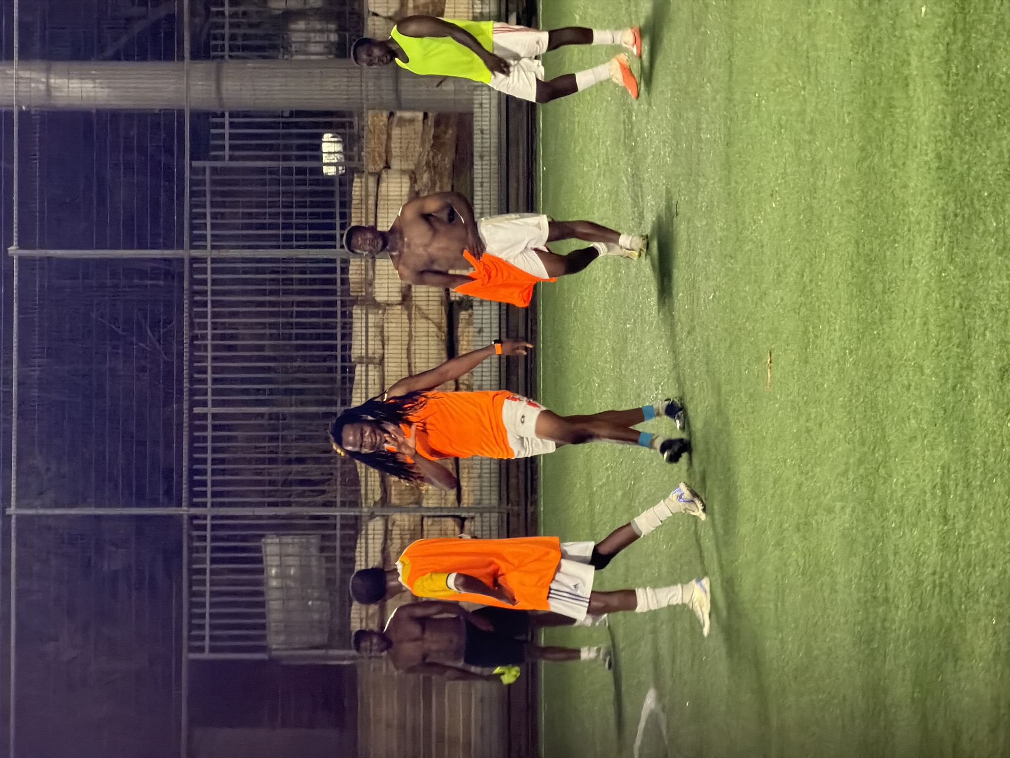 Evening soccer on a Tel Aviv turf field, plus street-level snapshots