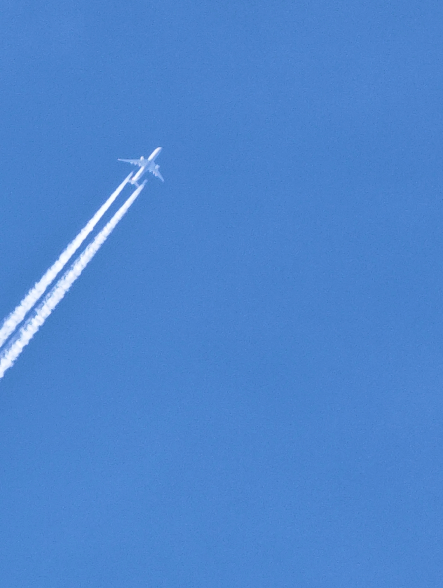 Aircraft leaves contrail over Vratsa, Bulgaria early morning