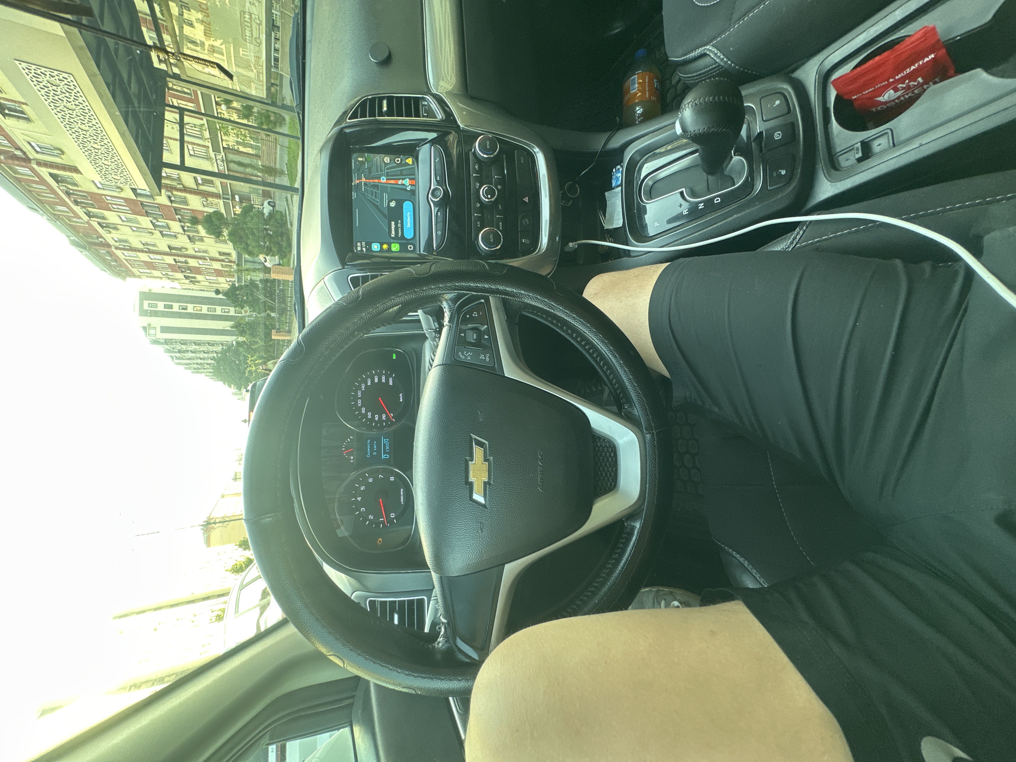 Driving through Tashkent at golden hour in a Chevrolet