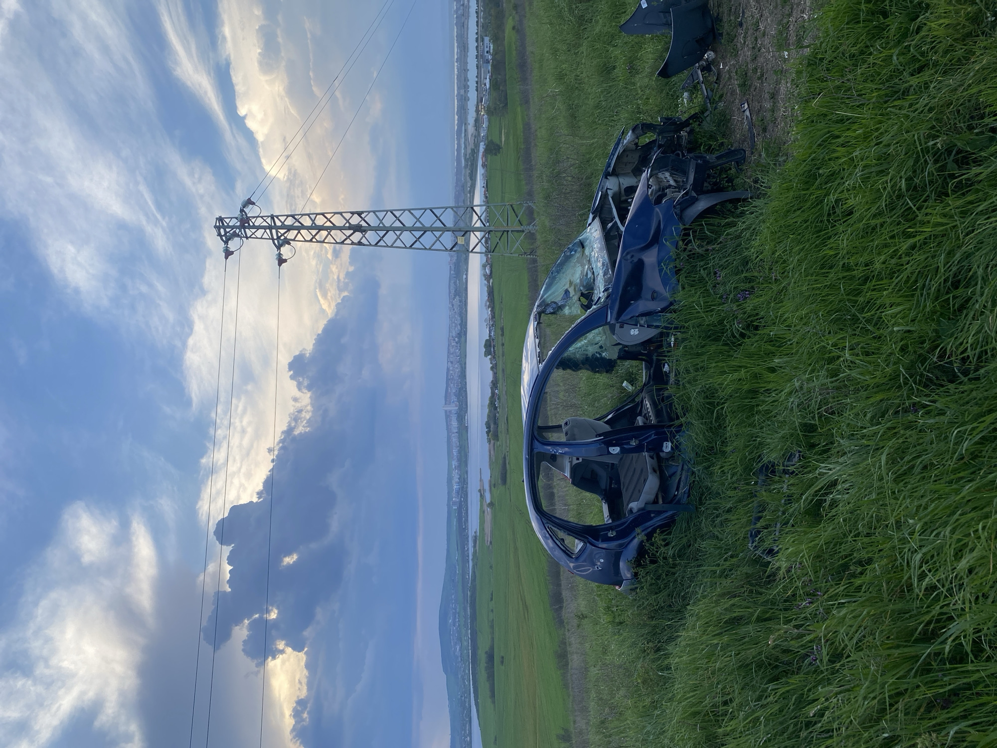 Stripped car wreck found in grass near Tvarditsa