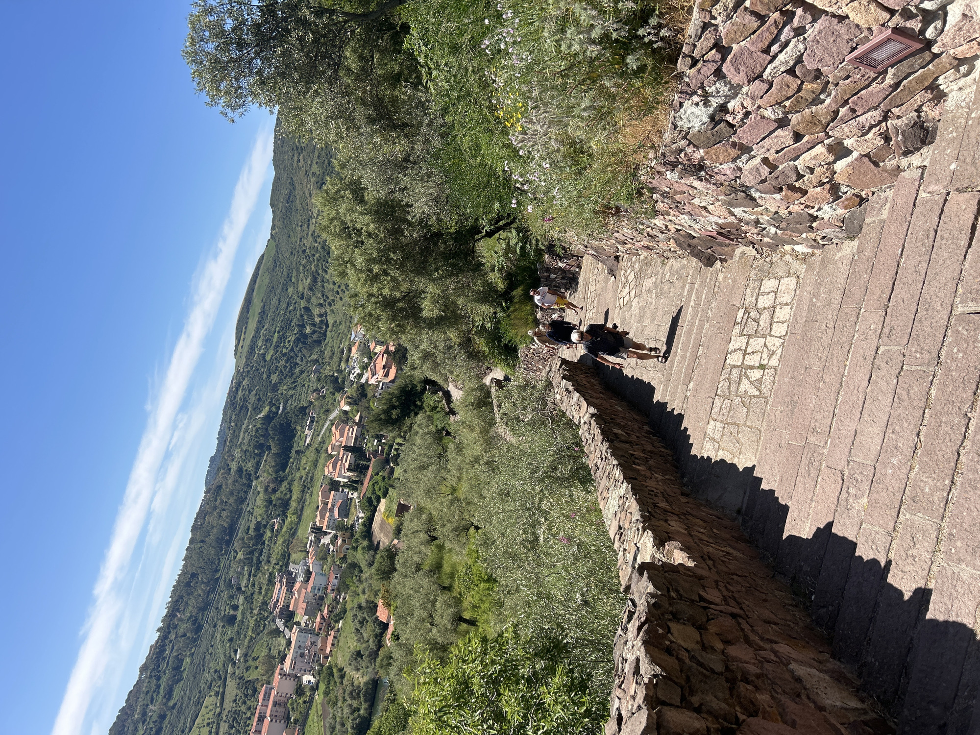 Tourist explores historic fortress complex in Bosa, Italy