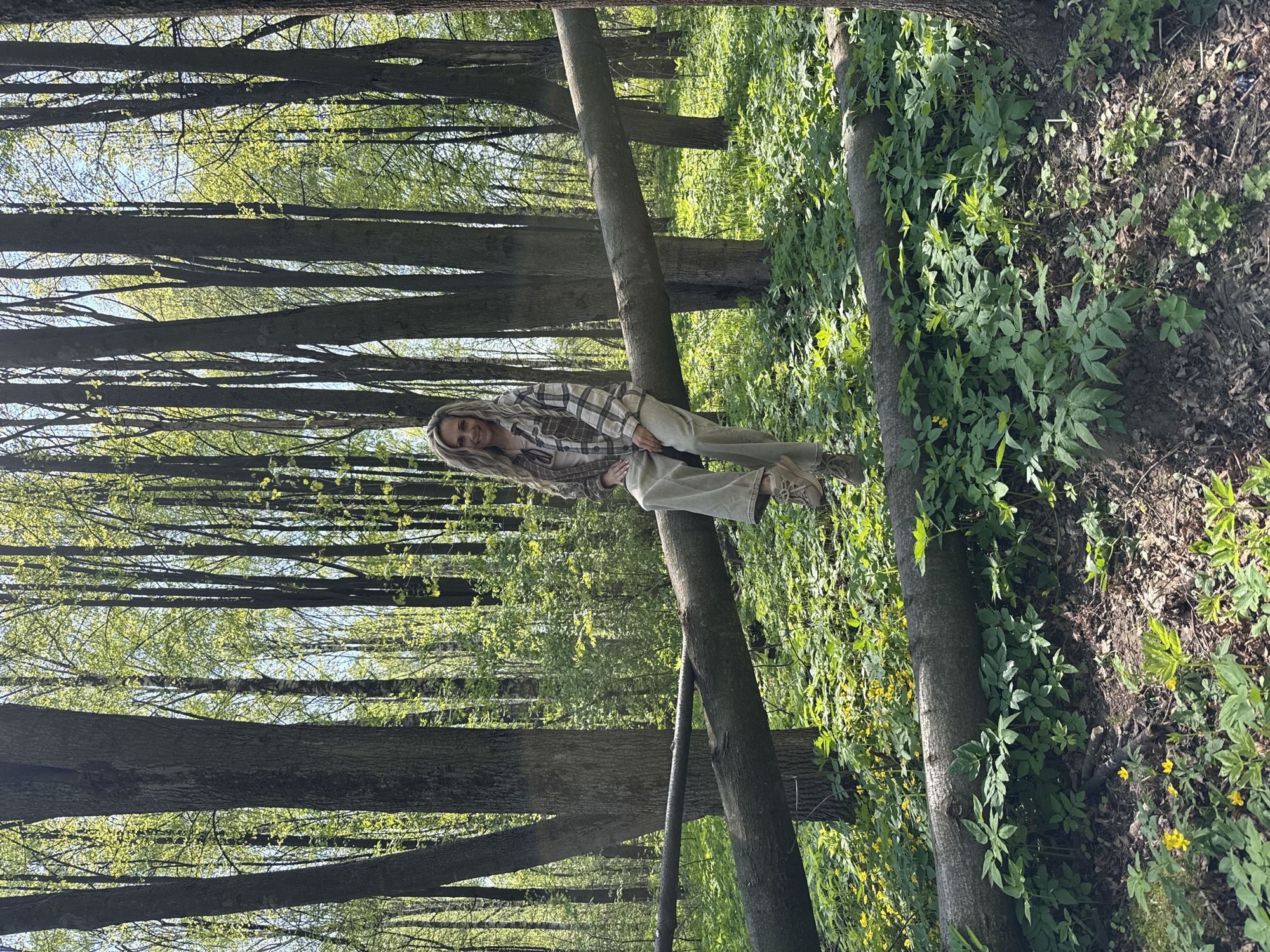 Woman and child enjoy forest outing in Rusanovo
