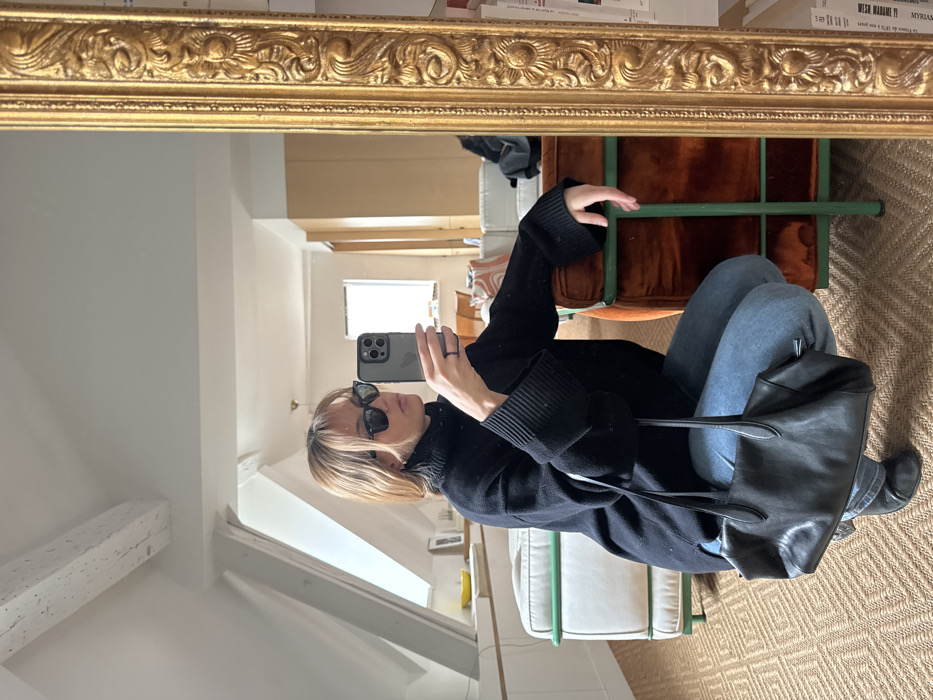 Woman documents Paris apartment interior through mirror selfies