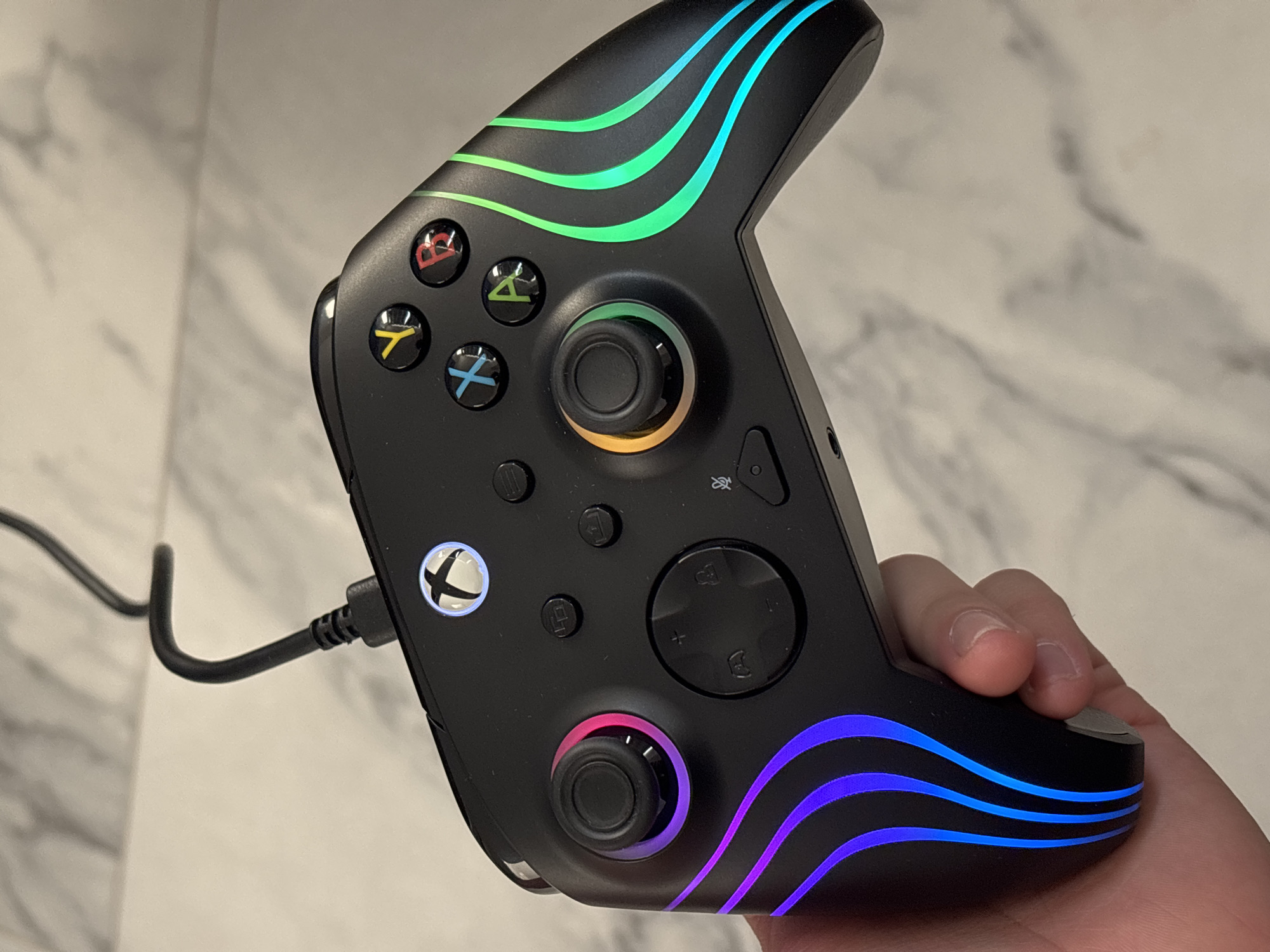 Xbox controller with LED lights held in Mexico