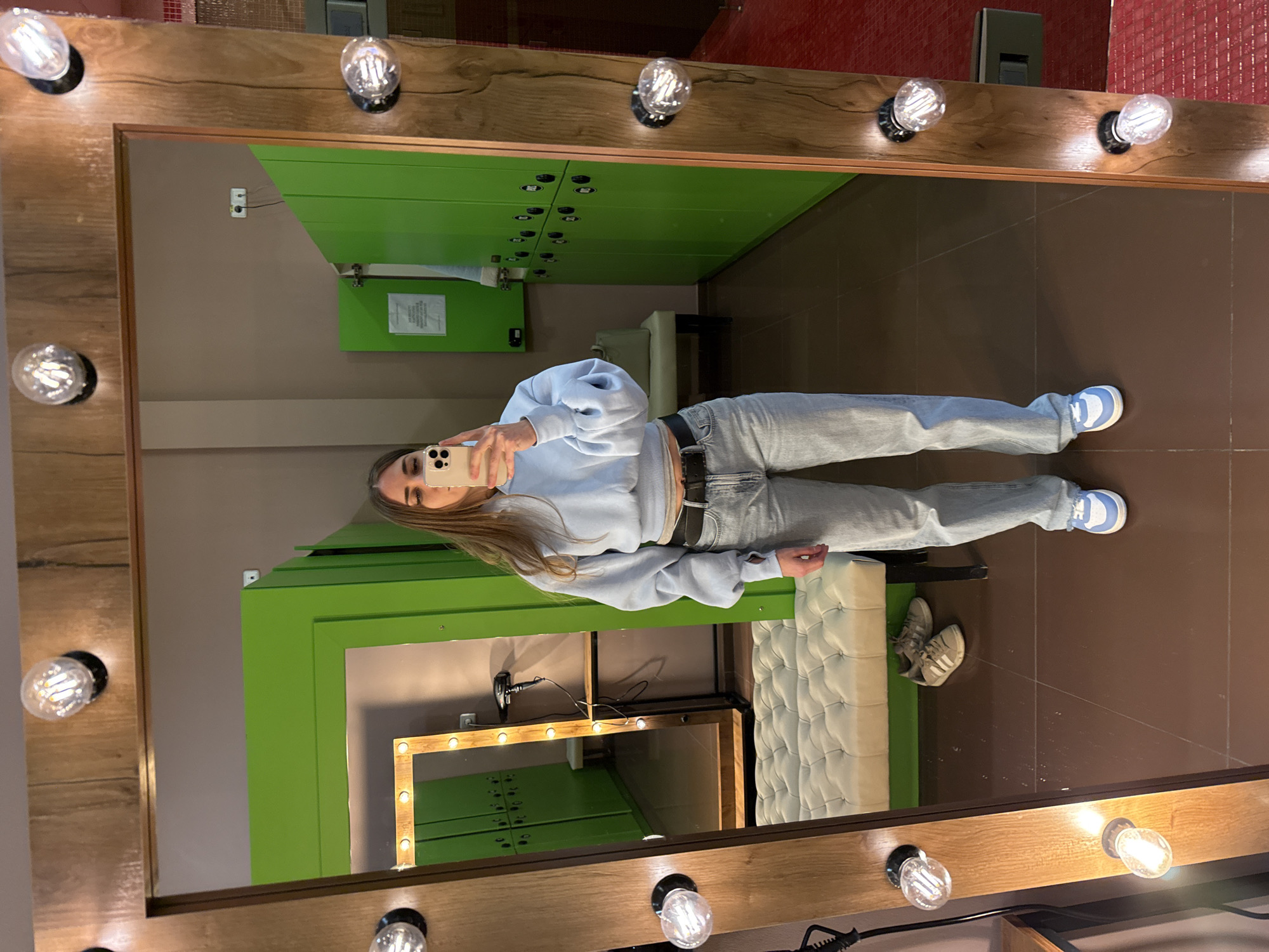 Woman takes mirror selfies in Moscow changing room