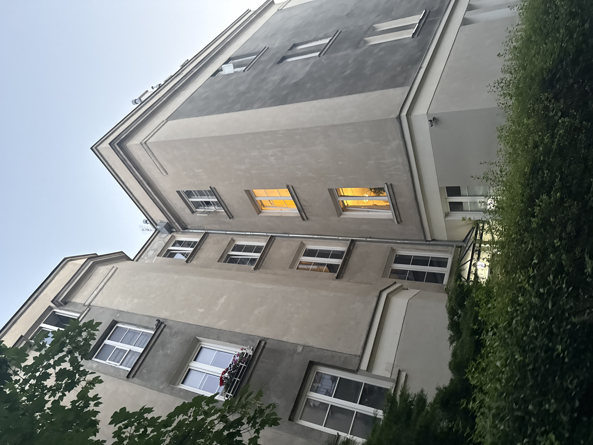 Evening dog walk through a Warsaw residential neighborhood