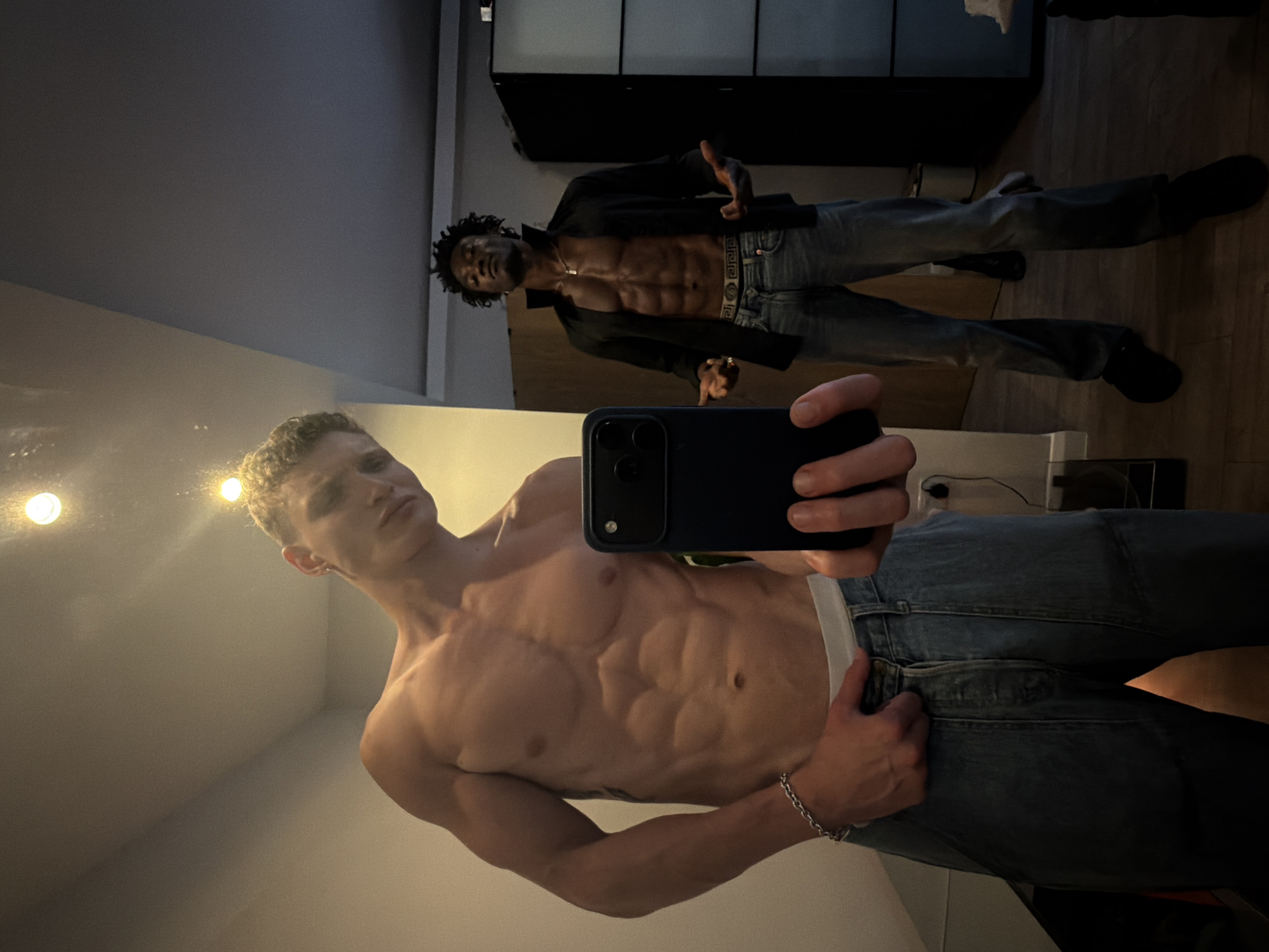 Man takes mirror selfies in London bathroom