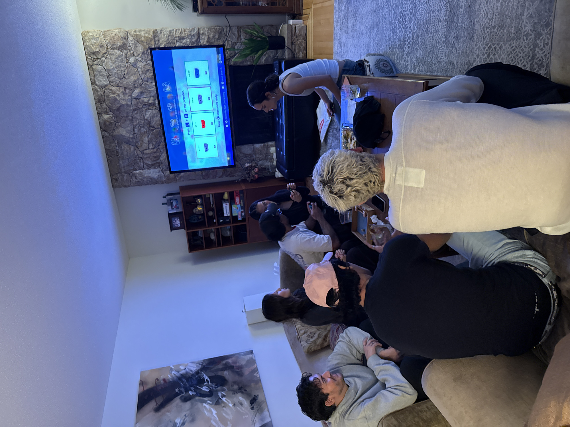 Late night TV gathering in North Vancouver living room