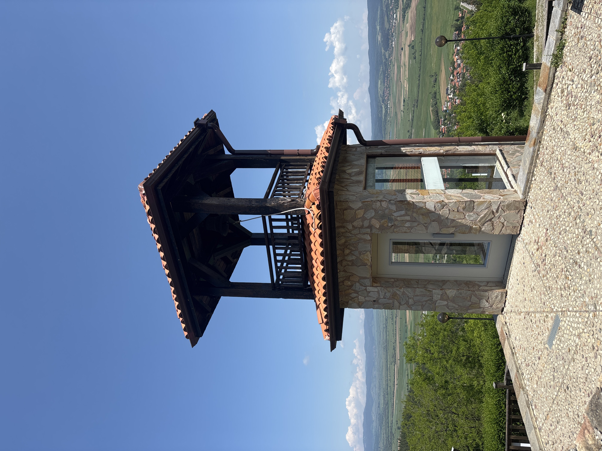 Visitors document medieval fortress complex during morning tour in Bulgaria