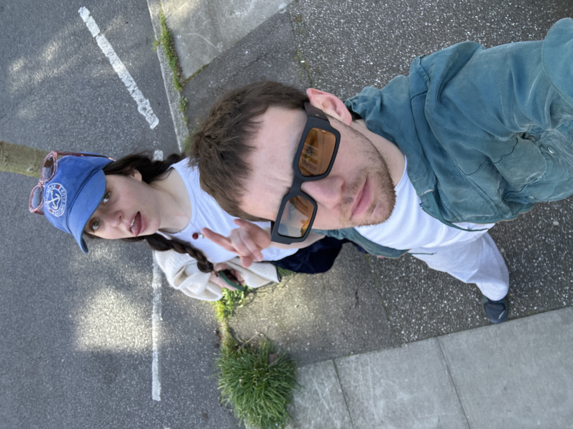 Couple photographed and filmed walking on London sidewalk