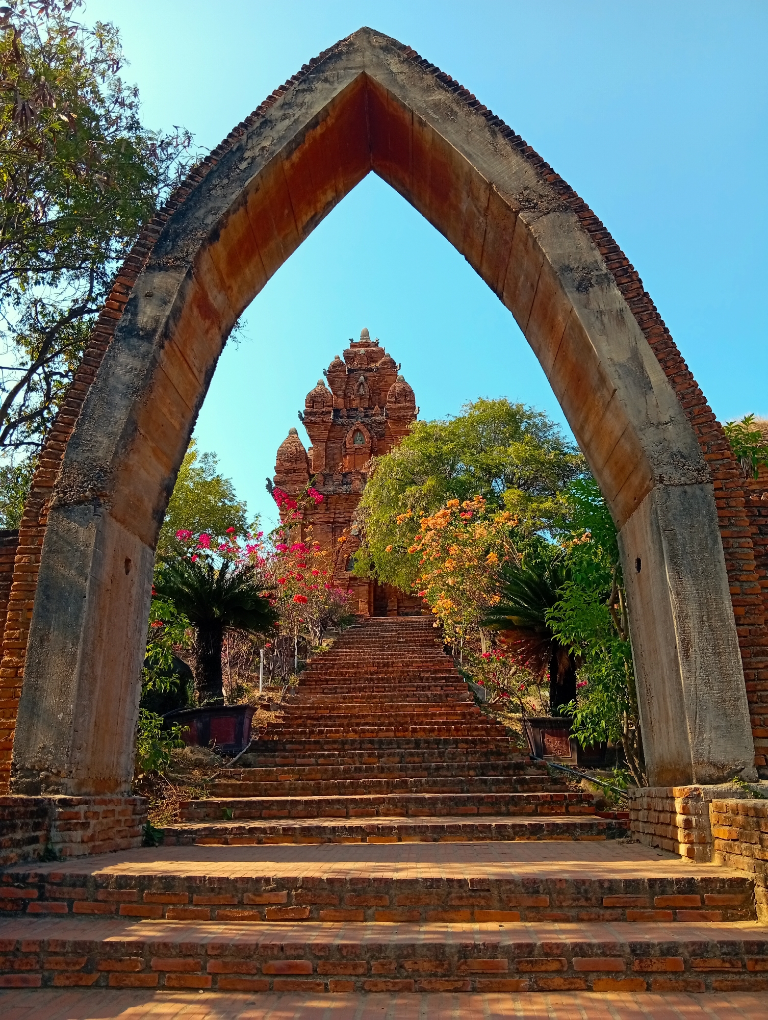 Tourist documents ancient Cham temples in Phan Rang Vietnam